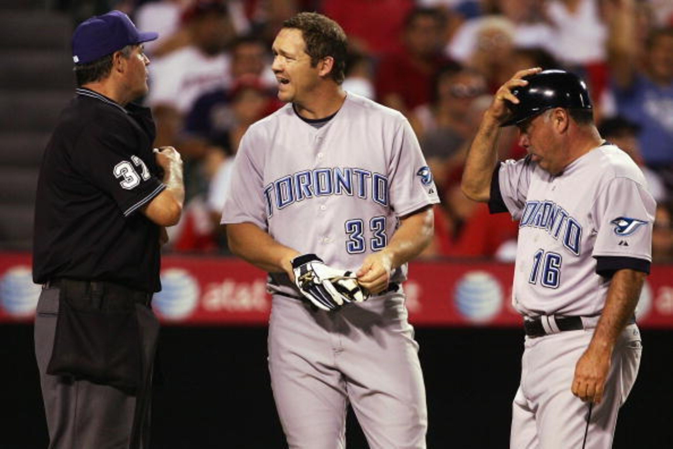 ANAHEIM, CA - JULY 04: Scott Rolen #33 and Third Base Coach John McDonald #16 of the Toronto Blue Jays argue over a call with Umpire Paul Emmel during the game against the Los Angeles Angels of Anaheim at Angels Stadium on July 4, 2008 in Anaheim, Califo ANAHEIM, CA - JULY 04: Scott Rolen #33 and Third Base Coach John McDonald #16 of the Toronto Blue Jays argue over a call with Umpire Paul Emmel during the game against the Los Angeles Angels of Anaheim at Angels Stadium on July 4, 2008 in Anaheim, Califo