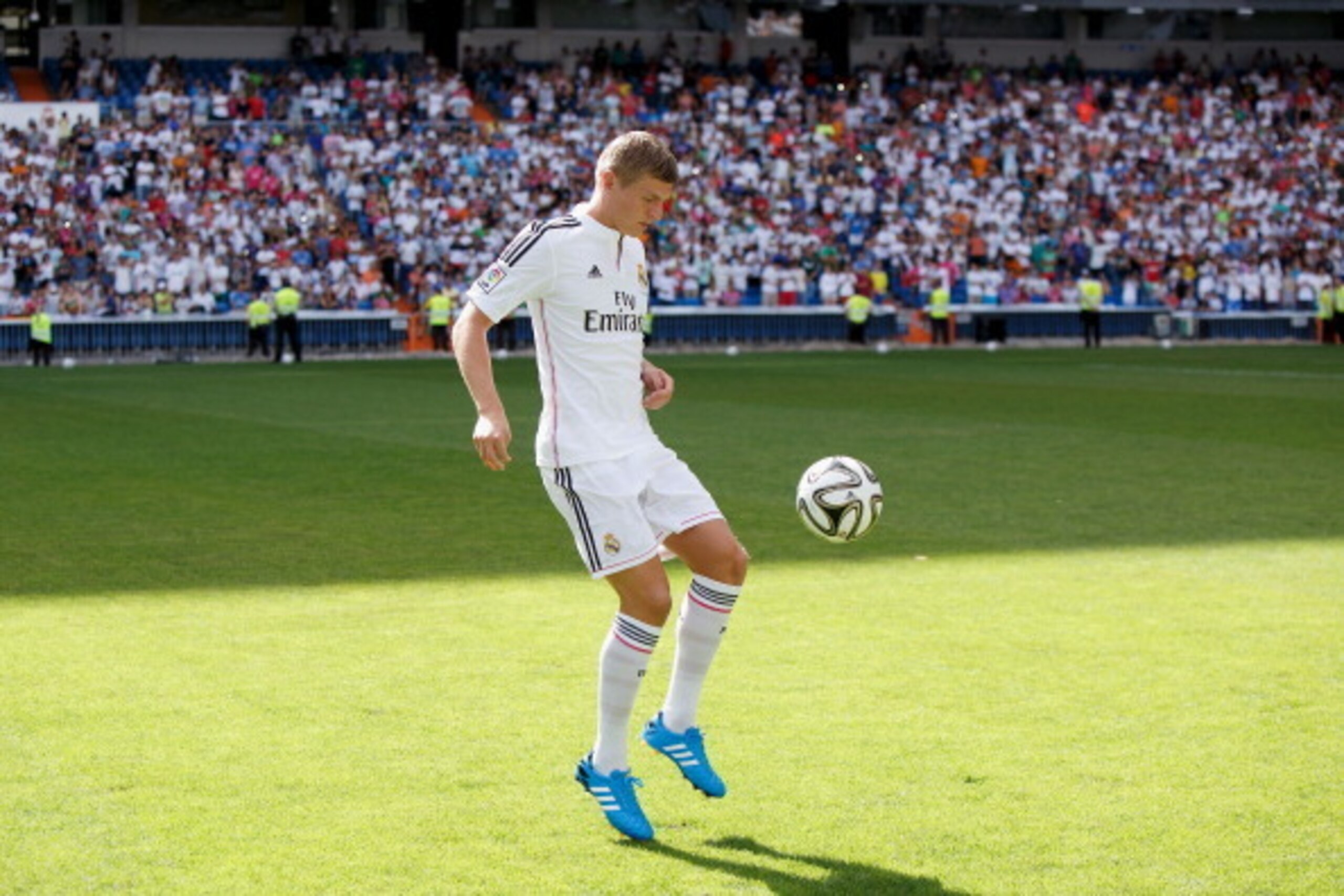 MADRID, SPAIN - JULY 17:  . Toni Kroos with the ball in his new Real Madrid shirt during his official unveiling at Santiago Bernabeu Stadium on July 17, 2014 in Madrid, Spain. Toni Kroos who won the World Cup with Germany in Brazil is Real Madrid's first 