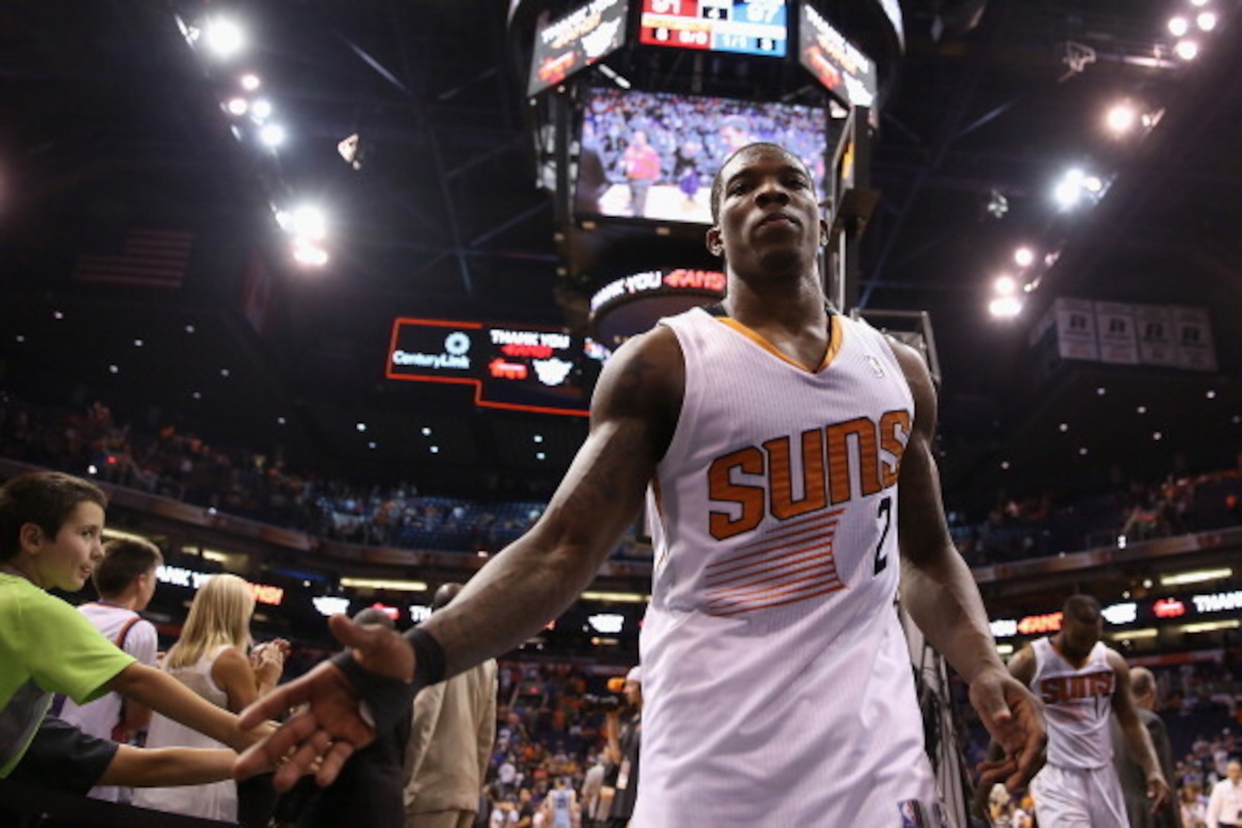 PHOENIX, AZ - APRIL 14: Eric Bledsoe #2 of the Phoenix Suns high fives fans as he walks off the court following the NBA game against the Memphis Grizzlies at US Airways Center on April 14, 2014 in Phoenix, Arizona. The Grizzlies defeated the Suns 97-91. PHOENIX, AZ - APRIL 14: Eric Bledsoe #2 of the Phoenix Suns high fives fans as he walks off the court following the NBA game against the Memphis Grizzlies at US Airways Center on April 14, 2014 in Phoenix, Arizona. The Grizzlies defeated the Suns 97-91.