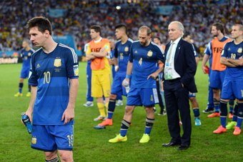 RIO DE JANEIRO, BRAZIL - JULY 13:  Lionel Messi looks on after being defeated by Germany 1-0 in extra time during the 2014 FIFA World Cup Brazil Final match between Germany and Argentina at Maracana on July 13, 2014 in Rio de Janeiro, Brazil.  (Photo by J