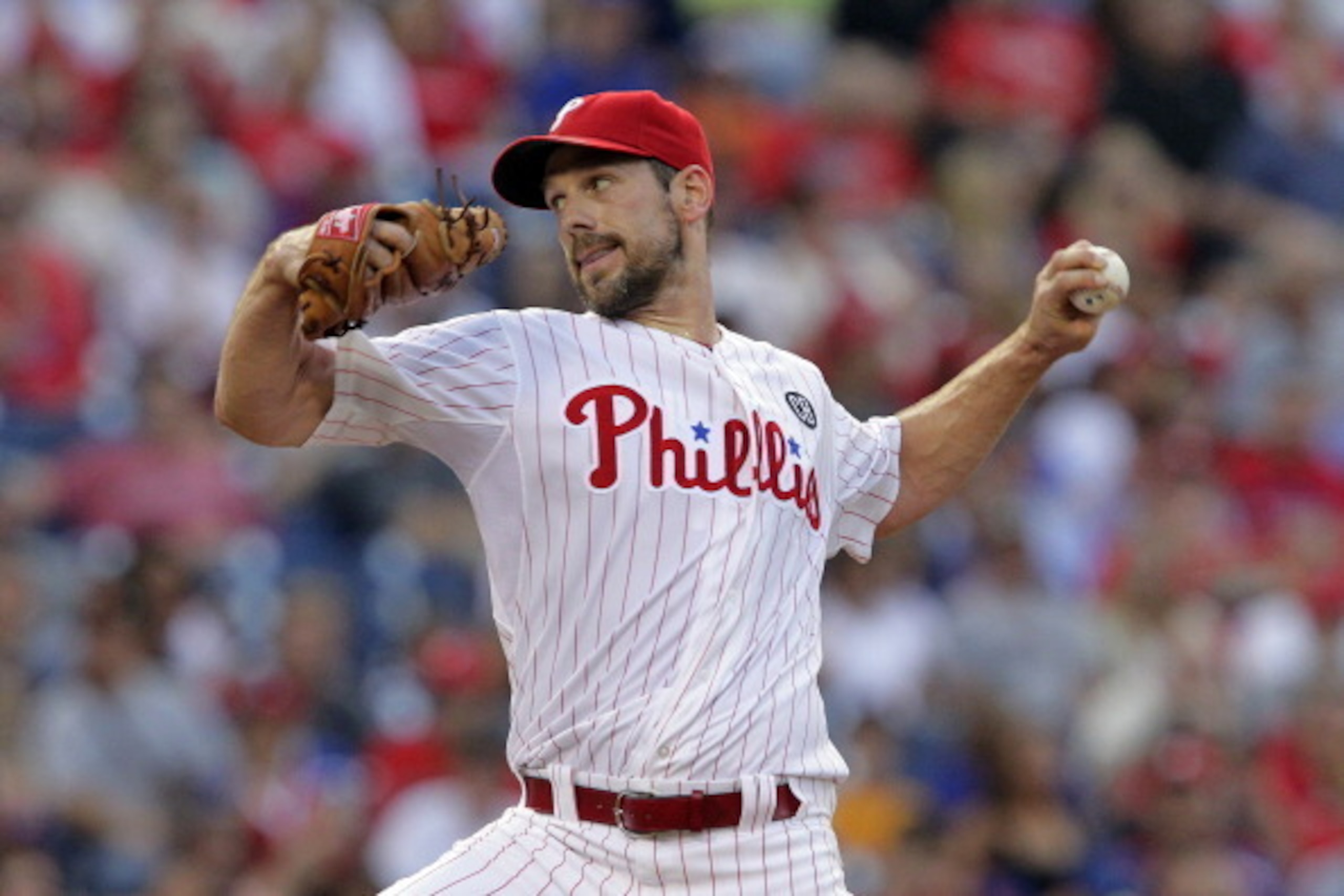 PHILADELPHIA - JULY 21: Starter Cliff Lee #33 of the Philadelphia Phillies throws a pitch in the second inning during a game against the San Francisco Giants at Citizens Bank Park on July 21, 2014 in Philadelphia, Pennsylvania. (Photo by Hunter Martin/Get