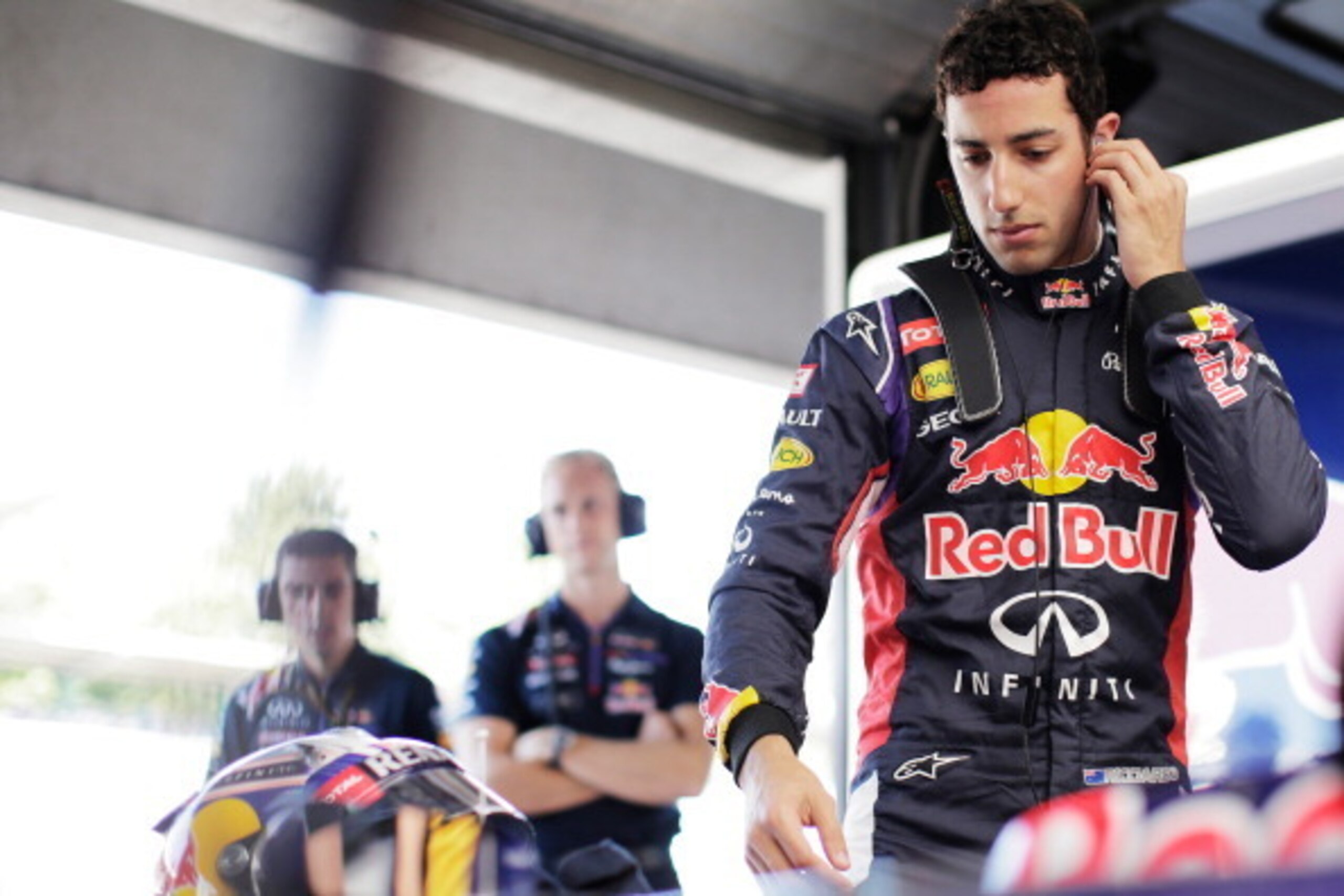 HOCKENHEIM, GERMANY - JULY 18: Daniel Ricciardo of Australia and Infiniti Red Bull Racing prepares in the garage during practice ahead of the German Grand Prix at Hockenheimring on July 18, 2014 in Hockenheim, Germany. (Photo by Adam Pretty/Getty Images) HOCKENHEIM, GERMANY - JULY 18: Daniel Ricciardo of Australia and Infiniti Red Bull Racing prepares in the garage during practice ahead of the German Grand Prix at Hockenheimring on July 18, 2014 in Hockenheim, Germany. (Photo by Adam Pretty/Getty Images)