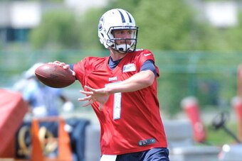 NASHVILLE, TN - MAY 16:  Quarterback Zach Mettenberger works out during the Tennesse Titans rookie minicamp on May 16, 2014 in Nashville, Tennessee.  (Photo by Frederick Breedon/Getty Images)