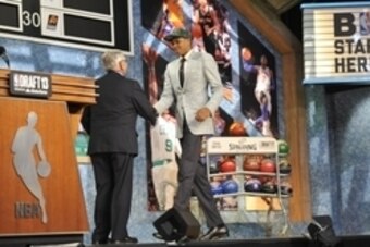 Jun 27, 2013; Brooklyn, NY, USA; Giannis Antetokounmpo shakes hands with NBA commissoiner David Stern after being selected as the number fifteen overall pick to the Milwaukee Bucks during the 2013 NBA Draft at the Barclays Center. Mandatory Credit: Joe Ca