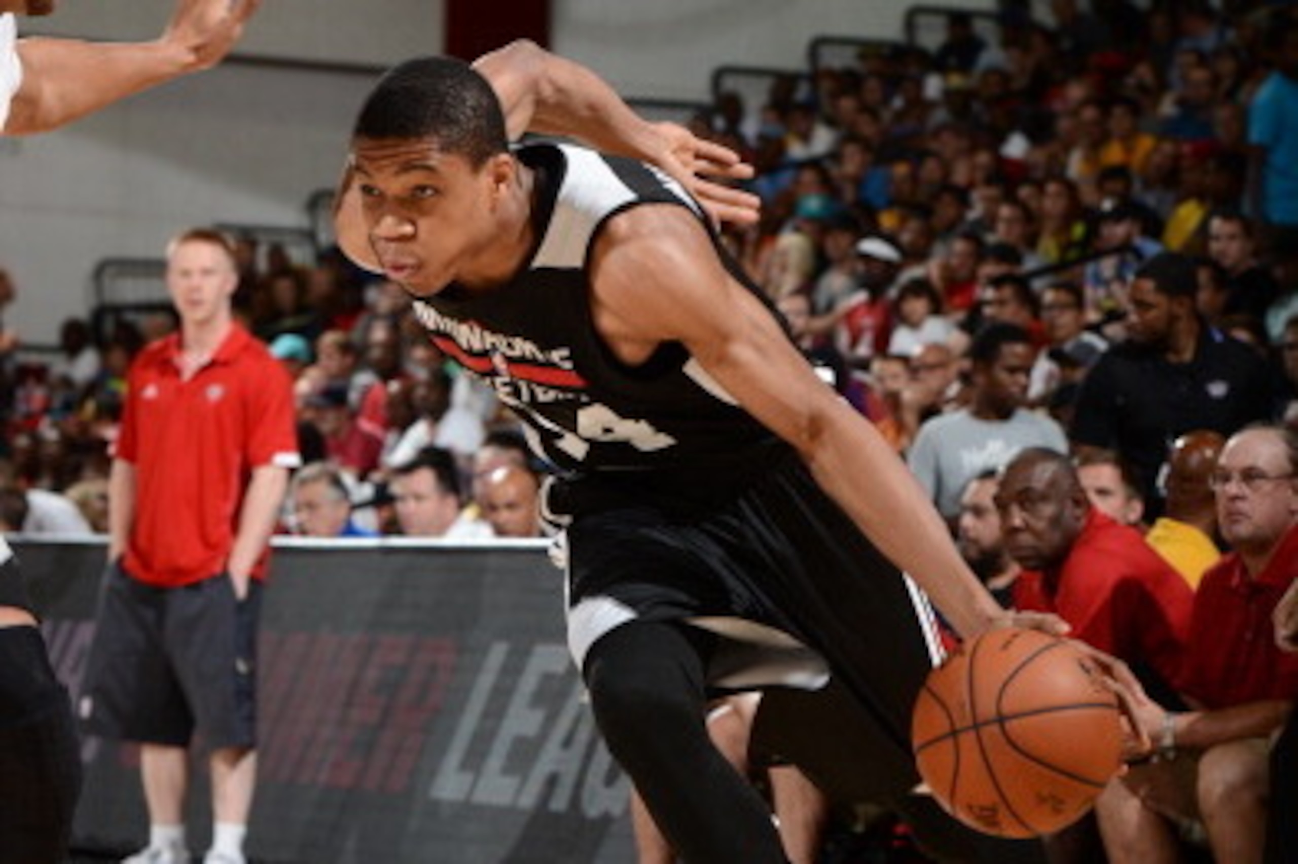 LAS VEGAS, NV - JULY 13: Giannis Antetokounmpo #34 of the Milwaukee Bucks handles the ball against the Phoenix Suns at the Samsung NBA Summer League 2014 on July 13, 2014 at the Cox Pavilion in Las Vegas, Nevada. NOTE TO USER: User expressly acknowledges 