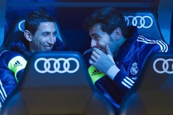 MADRID, SPAIN - APRIL 06: Goalkeeper Iker Casillas (R) of of Real Madrid CF Madrid on the bench with teammate Angel Di Maria (L) prior to tries to start the La Liga match between Real Madrid CF and Levante UD at Santiago Bernabeu Stadium on April 6, 2013 