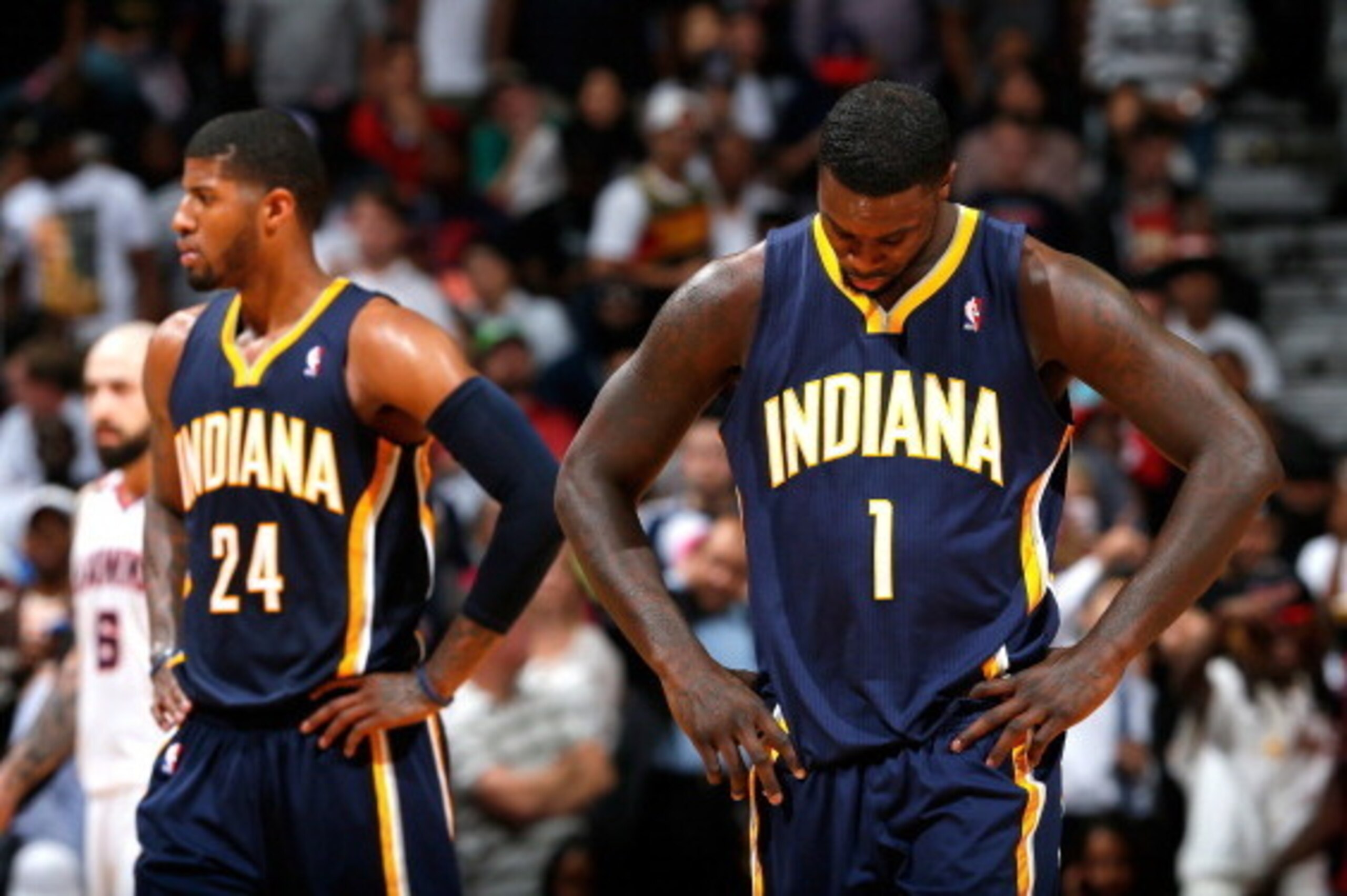 ATLANTA, GA - APRIL 24:  Lance Stephenson #1 and Paul George #24 of the Indiana Pacers react in the final minutes of their 98-85 loss to the Atlanta Hawks in Game 3 of the Eastern Conference Quarterfinals during the 2014 NBA Playoffs at Philips Arena on A
