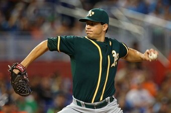 MIAMI, FL - JUNE 29:  Tommy Milone #57 of the Oakland Athletics pitches during a game against the Miami Marlins at Marlins Park on June 29, 2014 in Miami, Florida.  (Photo by Mike Ehrmann/Getty Images)