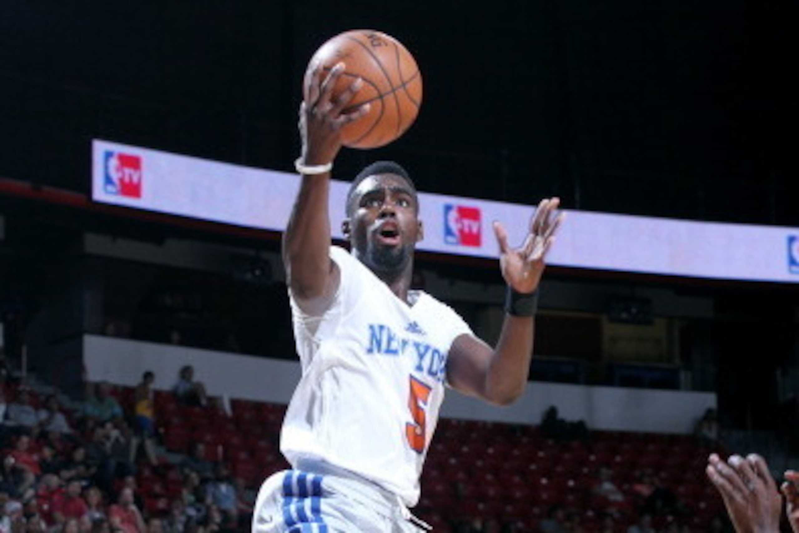 LAS VEGAS, NV - JULY 19: Tim Hardaway Jr. #5 of the New York Knicks shoots against the Charlotte Hornets during the Samsung NBA Summer League 2014 on July 19, 2014 at the Cox Pavilion in Las Vegas, Nevada. NOTE TO USER: User expressly acknowledges and agr