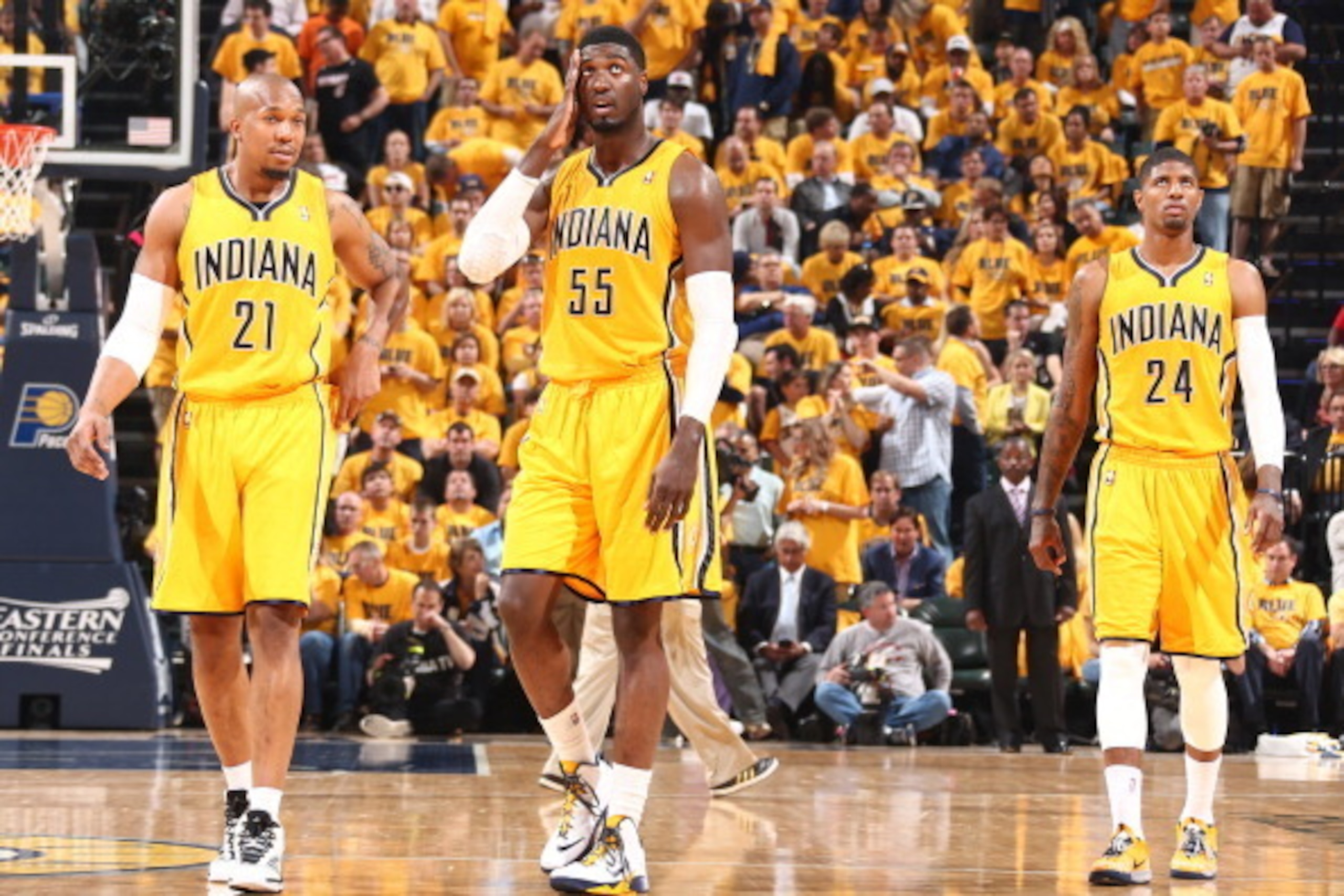 INDIANAPOLIS - MAY 18: David West #21, Roy hibbert #55 and Paul George #24 of the Indiana Pacers look on against the Miami Heat in game one of the East Conference Finals at Bankers Life Fieldhouse on May 18, 2014 in Indianapolis, Indiana.  NOTE TO USER: U