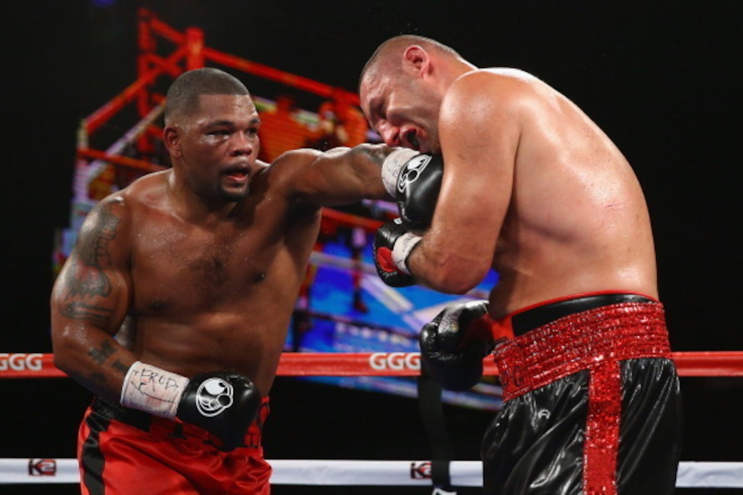 NEW YORK, NY - NOVEMBER 02:  Mike Perez punches  Magomed Abdusalamov during their Heavyweight fight at The Theater at Madison Square Garden on November 2, 2013 in New York City.  (Photo by Al Bello/Getty Images)