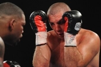 Nov 2, 2013; New York, NY, USA; Mike Perez (left) and Magomed Abdusalamov (black trunks) box during their heavyweight US NBC Champoinship bout at The Theater at Madison Square Garden. Perez won via unanimous decision. Mandatory Credit: Joe Camporeale-USA 
