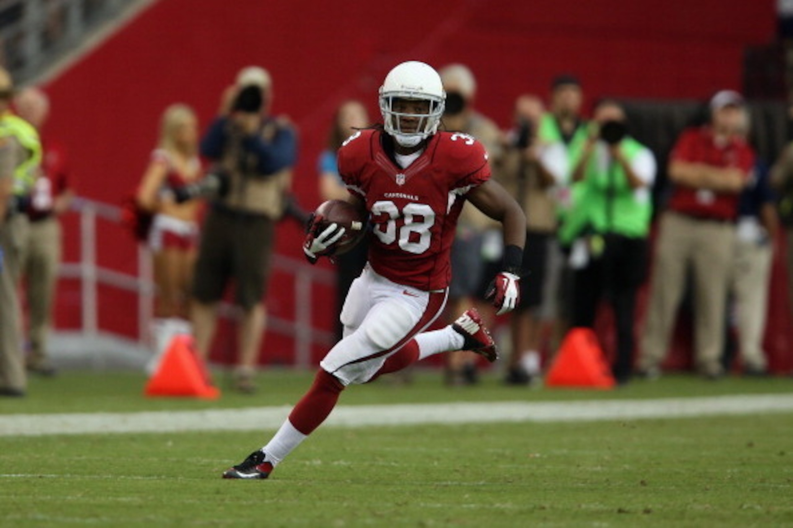 GLENDALE, AZ - SEPTEMBER 15:  Running back Andre Ellington #38 of the Arizona Cardinals carries the ball against the Detroit Lions at University of Phoenix Stadium on September 15, 2013 in Glendale, Arizona.  (Photo by Jeff Gross/Getty Images)
