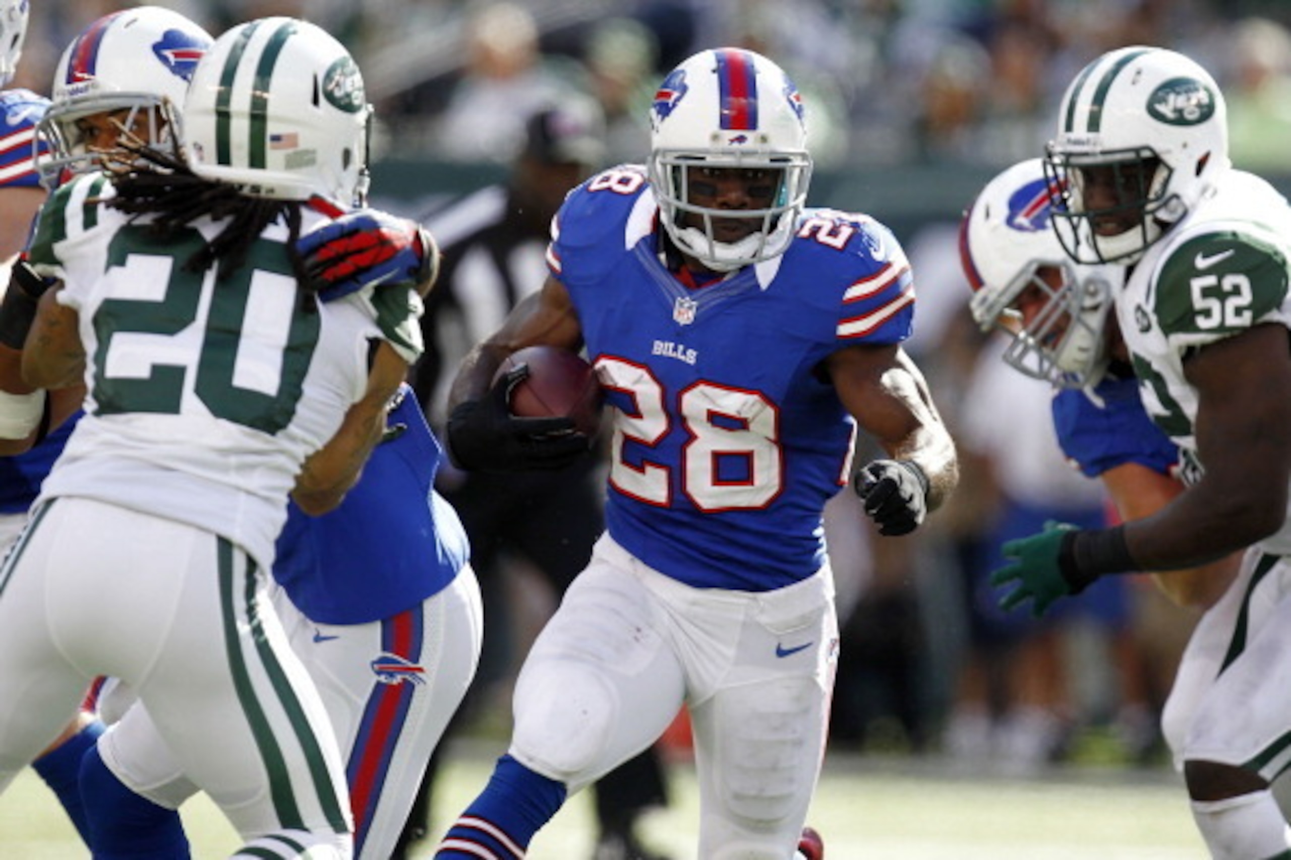 EAST RUTHERFORD, NJ - SEPTEMBER 09:   C.J. Spiller #28 of the Buffalo Bills runs against the New York Jets during their season opener at MetLife Stadium on September 9, 2012 in East Rutherford, New Jersey.  (Photo by Jeff Zelevansky/Getty Images)