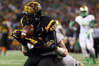 ARLINGTON, TX - OCTOBER 05:  Jaelen Strong #21 of the Arizona State Sun Devils makes a touchdown pass reception against Austin Collinsworth #28 of the Notre Dame Fighting Irish at at Cowboys Stadium on October 5, 2013 in Arlington, Texas.  (Photo by Ronal