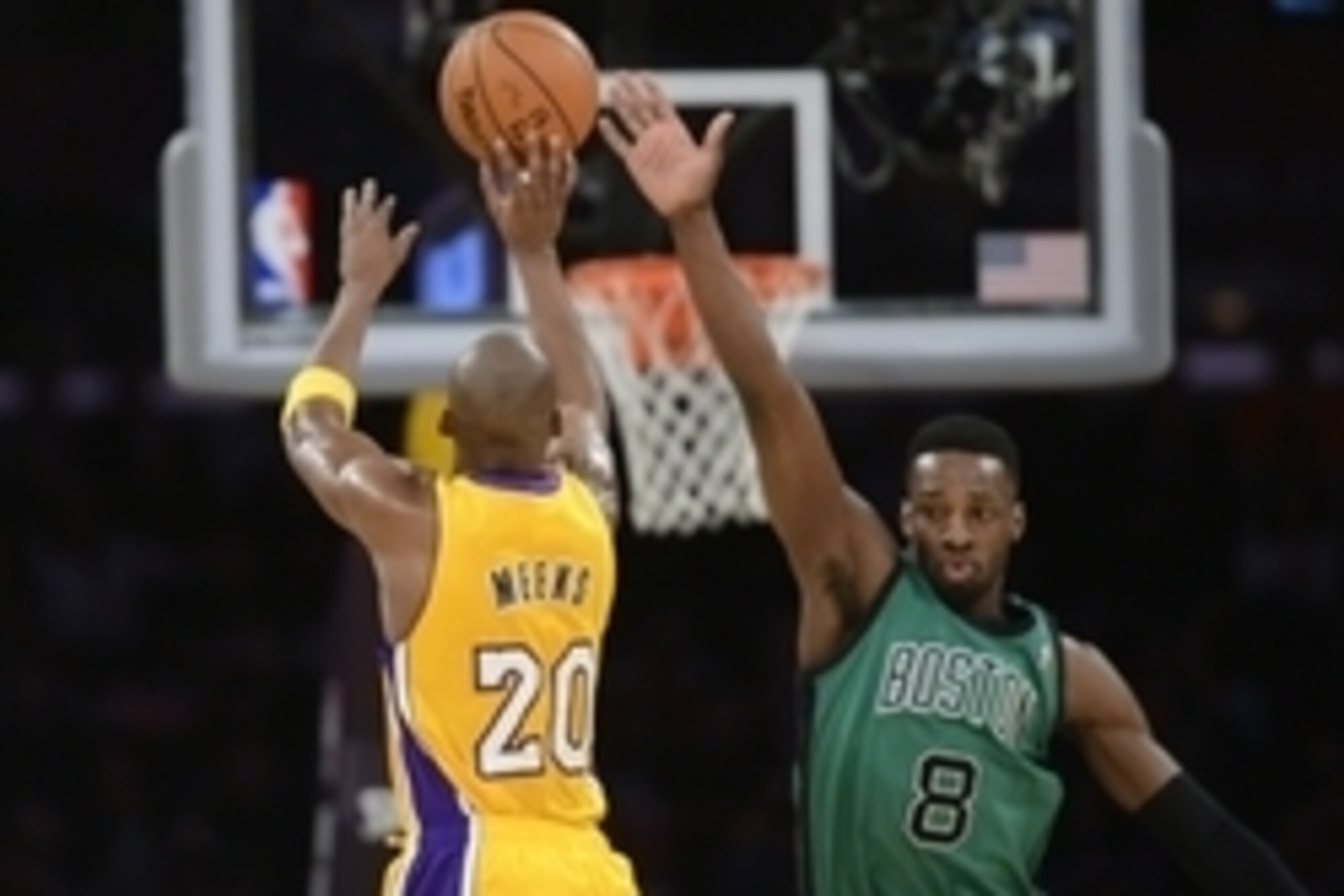 Feb 21, 2014; Los Angeles, CA, USA; Los Angeles Lakers guard Jodie Meeks (20) shoots the ball as Boston Celtics forward Jeff Green (8) defends during the first quarter at Staples Center. Mandatory Credit: Kelvin Kuo-USA TODAY Sports