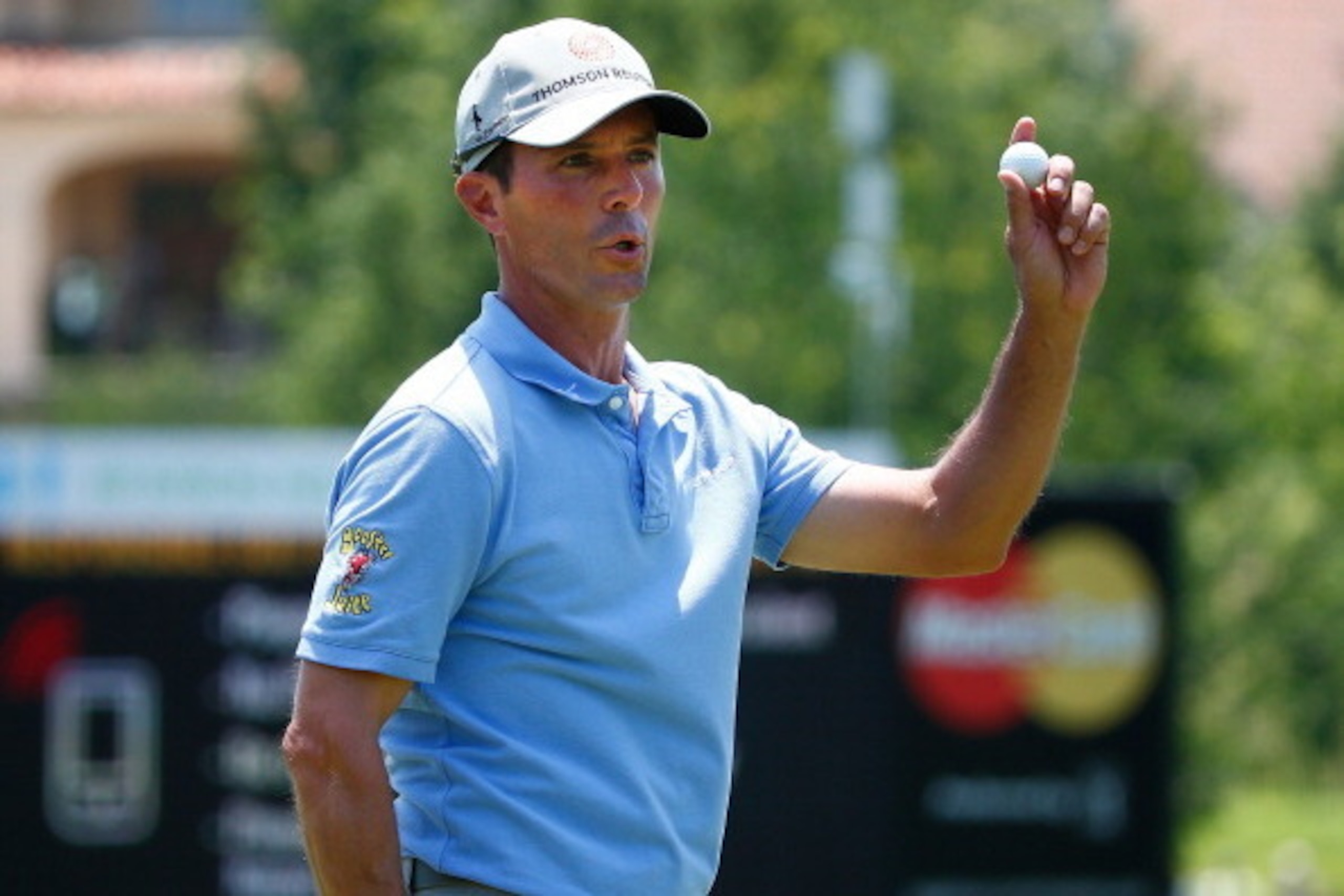 IRVING, TX - MAY 18:  Mike Weir of Canada acknowledges the gallery after a birdie on the fifth hole during the final round of the HP Byron Nelson Championship at the TPC Four Seasons on May 18, 2014 in Irving, Texas.  (Photo by Sam Greenwood/Getty Images)