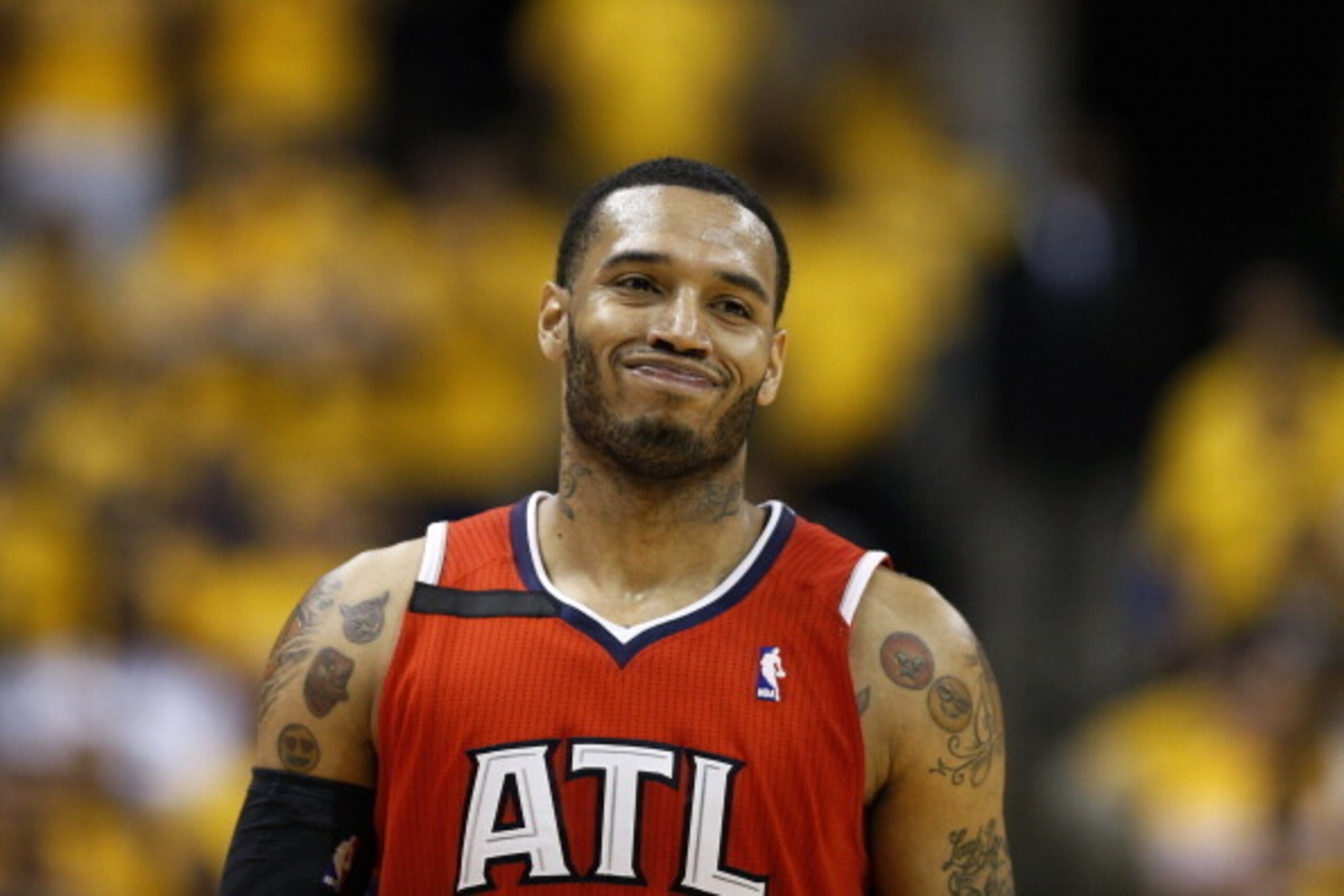 INDIANAPOLIS, IN - MAY 3: Mike Scott #32 of the Atlanta Hawks reacts against the Indiana Pacers during Game Seven of the Eastern Conference Quarterfinals of the 2014 NBA Playoffs on May 3, 2014 at Bankers Life Fieldhouse in Indianapolis, Indiana. The Pace