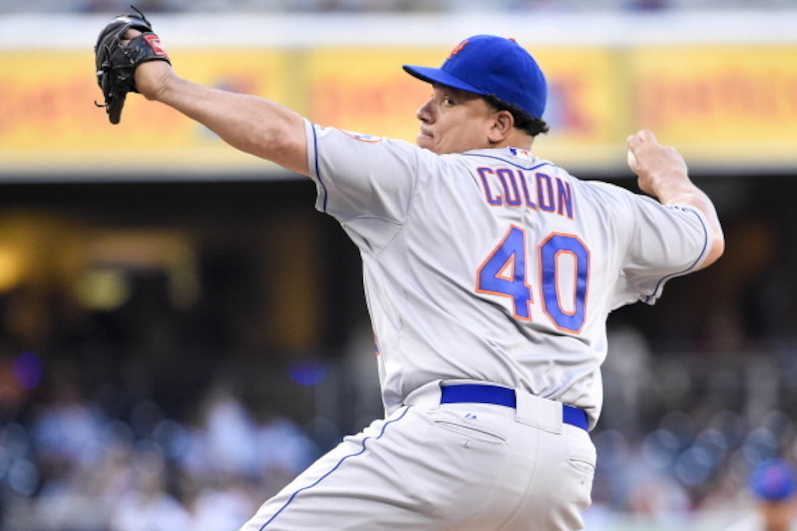 SAN DIEGO, CA - JULY 18:  Bartolo Colon #40 of the New York Mets pitches during the first inning of a baseball game against the San Diego Padres at Petco Park July 18, 2014 in San Diego, California.  (Photo by Denis Poroy/Getty Images)