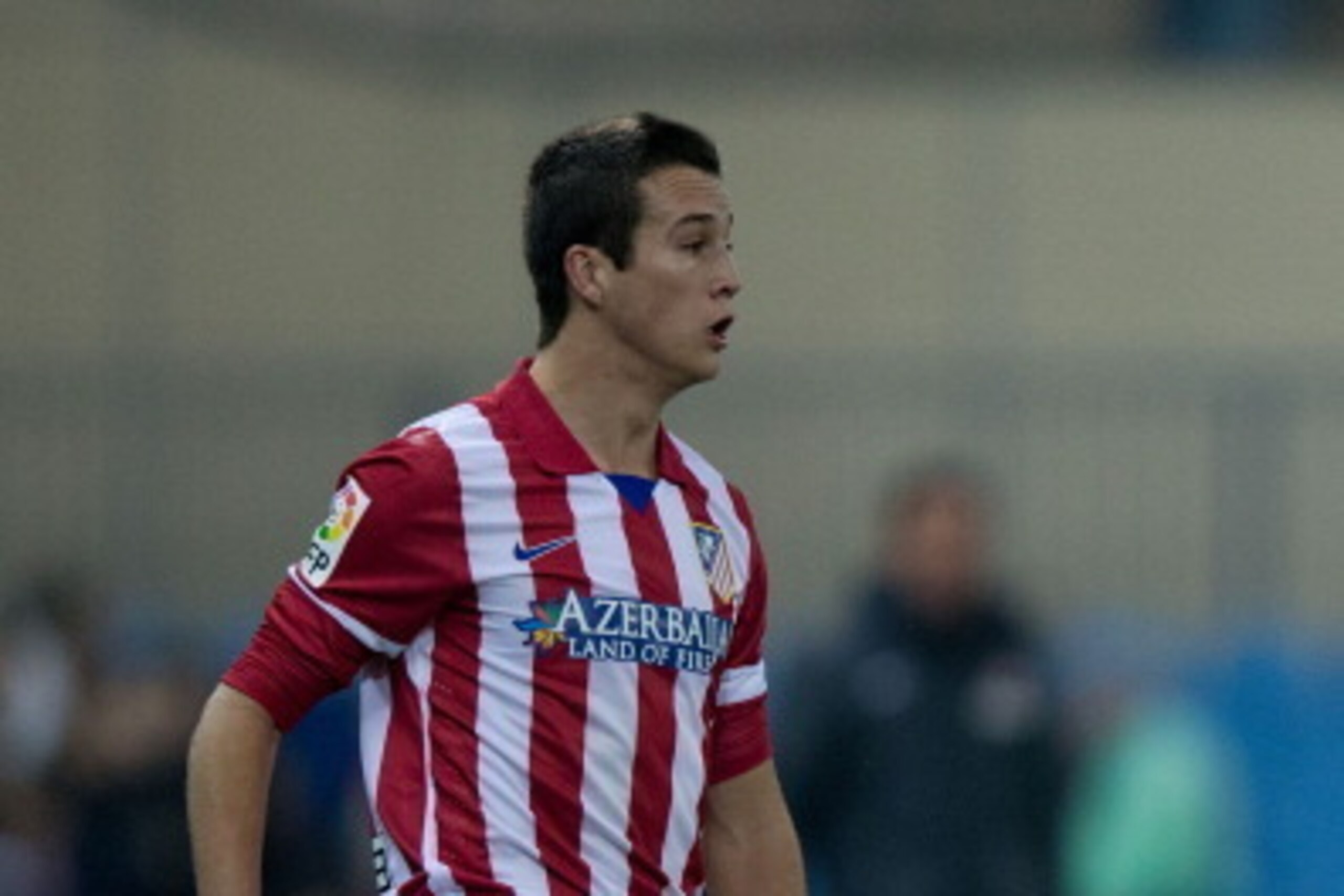 MADRID, SPAIN - DECEMBER 18: Javier Manquillo of Atletico de Madrid controls the ball during the Copa del Rey Round of 32 second leg match between Club Atletico de Madrid and Sant Andreu at Vivente Calderon Stadium on December 18, 2013 in Madrid, Spain.  