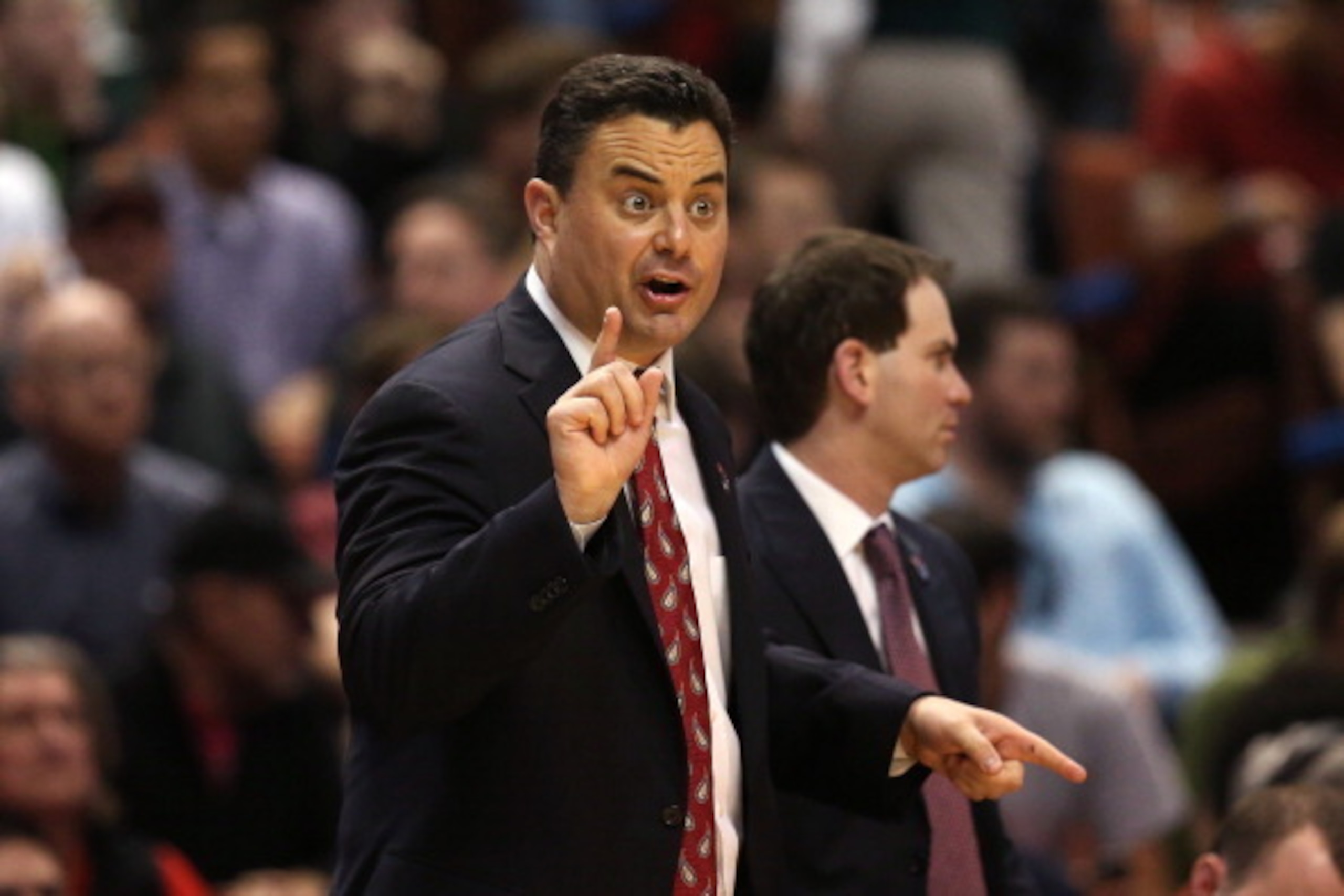 ANAHEIM, CA - MARCH 27:  Head coach Sean Miller of the Arizona Wildcats calls out in the first half while taking on the San Diego State Aztecs during the regional semifinal of the 2014 NCAA Men's Basketball Tournament at the Honda Center on March 27, 2014