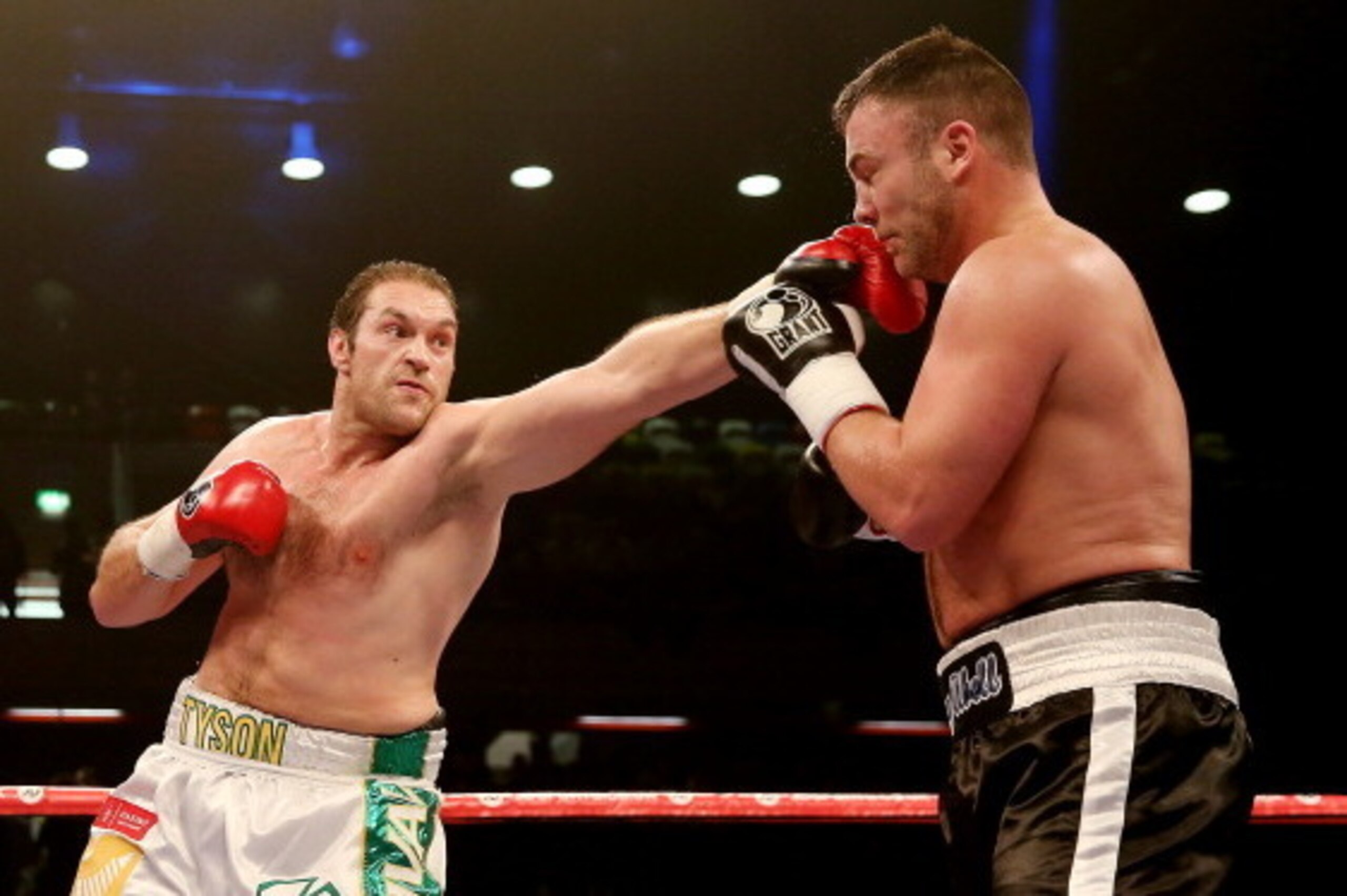 LONDON, ENGLAND - FEBRUARY 15:  Tyson Fury of Great Britain in action with Joey Abell of USA during their International Heavyweight bout at The Copper Box on February 15, 2014 in London, England.  (Photo by Scott Heavey/Getty Images)