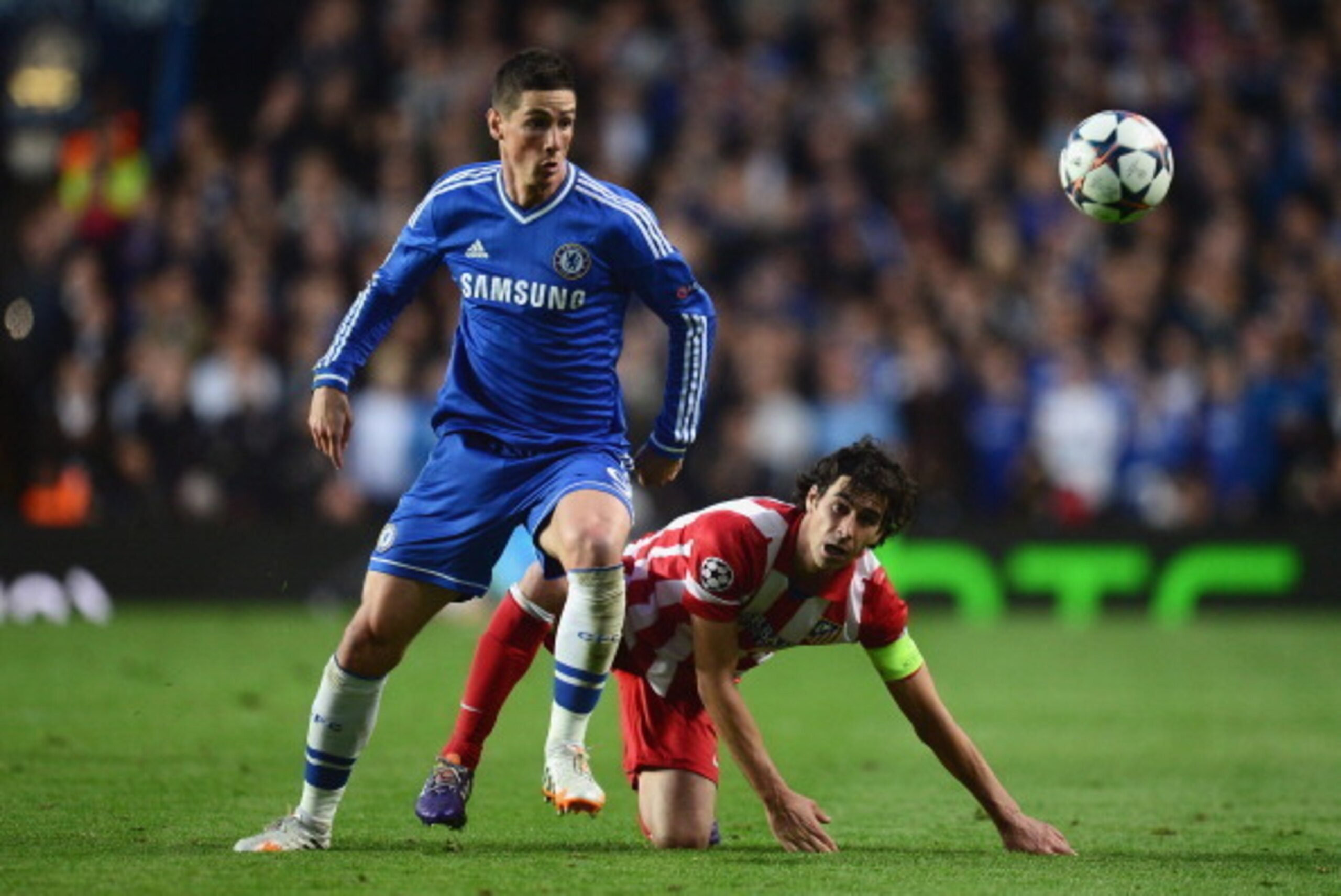 LONDON, ENGLAND - APRIL 30:  Fernando Torres of Chelsea goes past Tiago of Club Atletico de Madrid during the UEFA Champions League semi-final second leg match between Chelsea and Club Atletico de Madrid at Stamford Bridge on April 30, 2014 in London, Eng