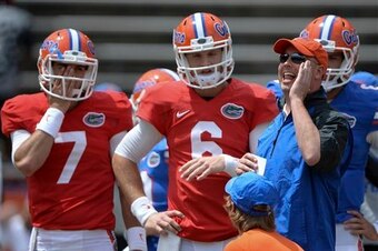Florida QB Jeff Driskel (center) and OC Kurt Roper (right)