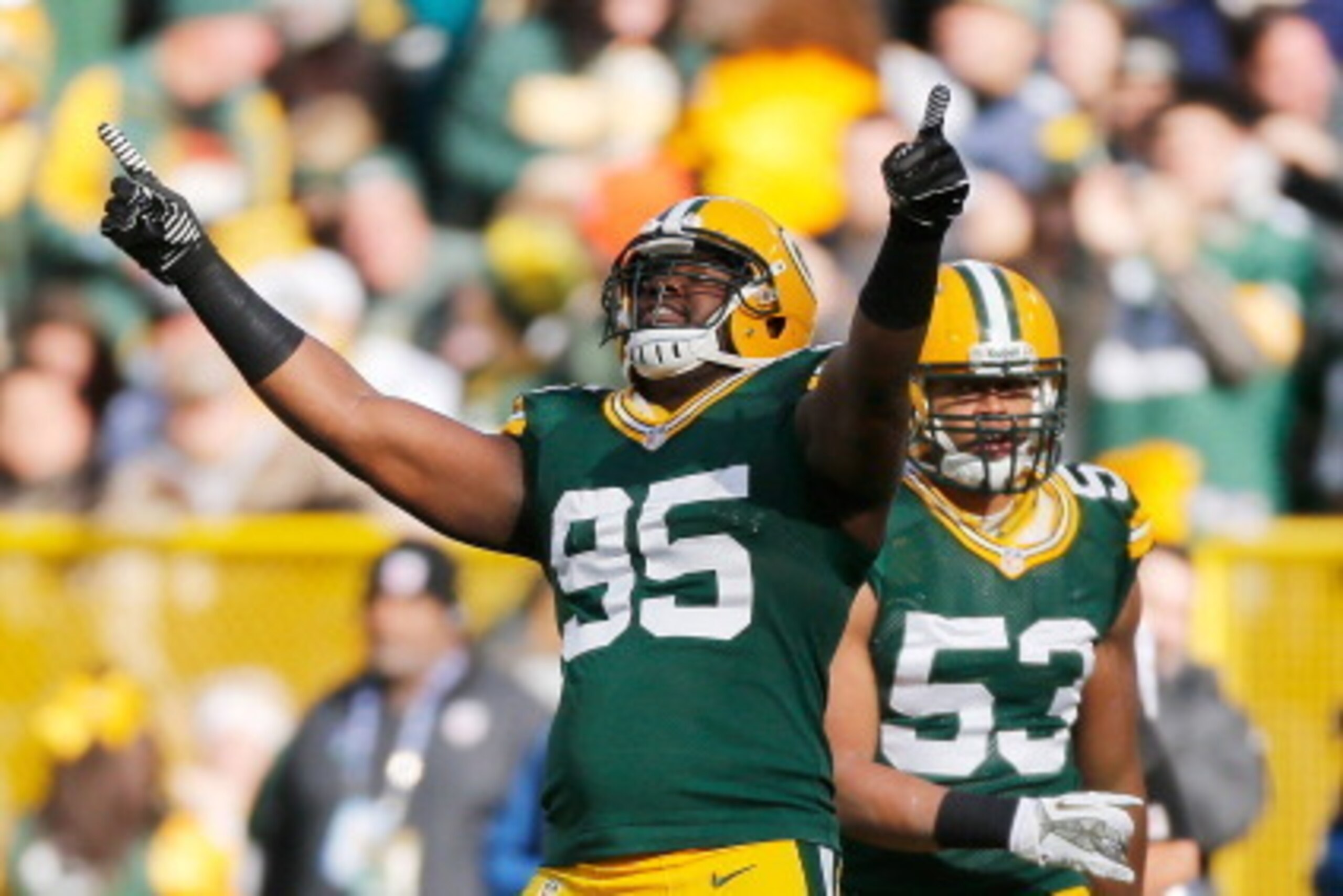 GREEN BAY, WI - NOVEMBER 10: Datone Jones #95 of the Green Bay Packers celebrates a first quarter sack while playing the Philadelphia Eagles at Lambeau Field on November 10, 2013 in Green Bay, Wisconsin. (Photo by Gregory ShamusGetty Images)