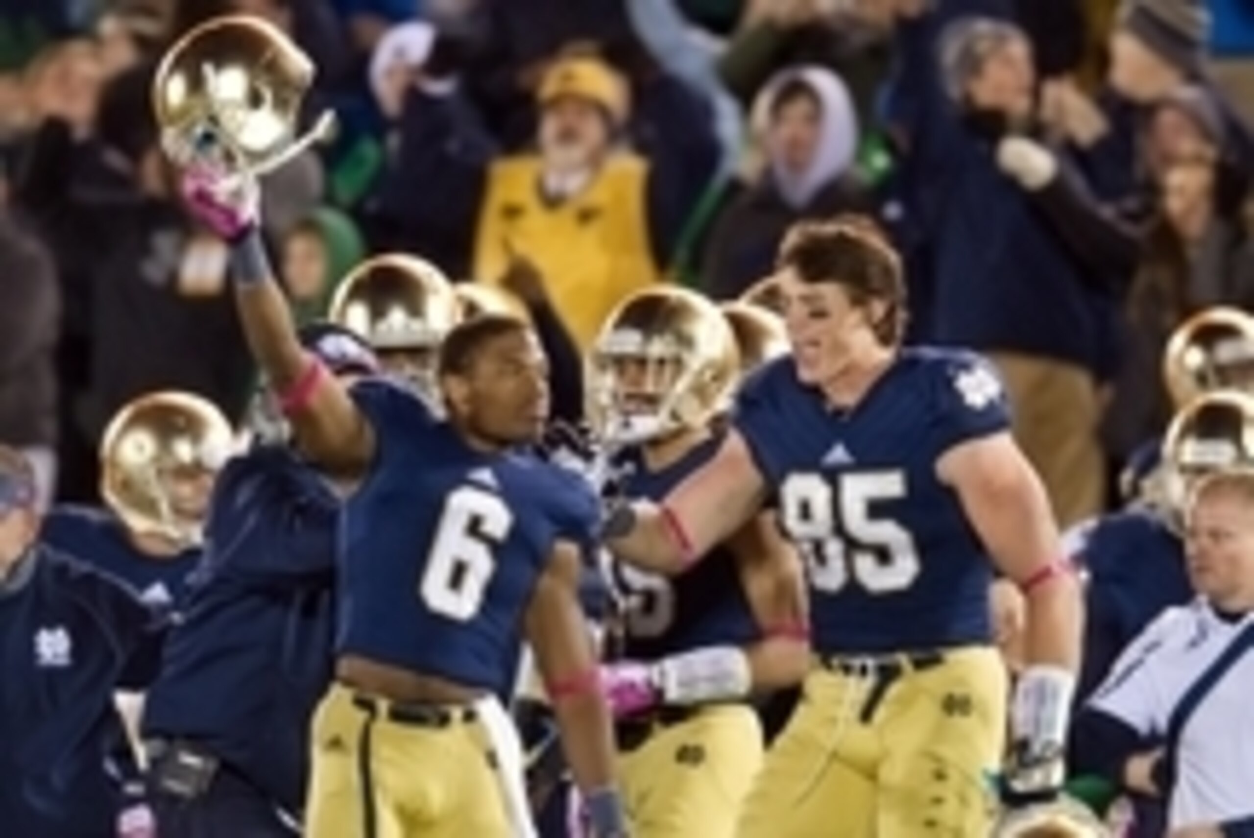 Oct 19, 2013; South Bend, IN, USA; Notre Dame Fighting Irish cornerback KeiVarae Russell (6) and tight end Troy Niklas (85) celebrate in the fourth quarter against the USC Trojans at Notre Dame Stadium. Notre Dame won 14-10. Mandatory Credit: Matt Cashore