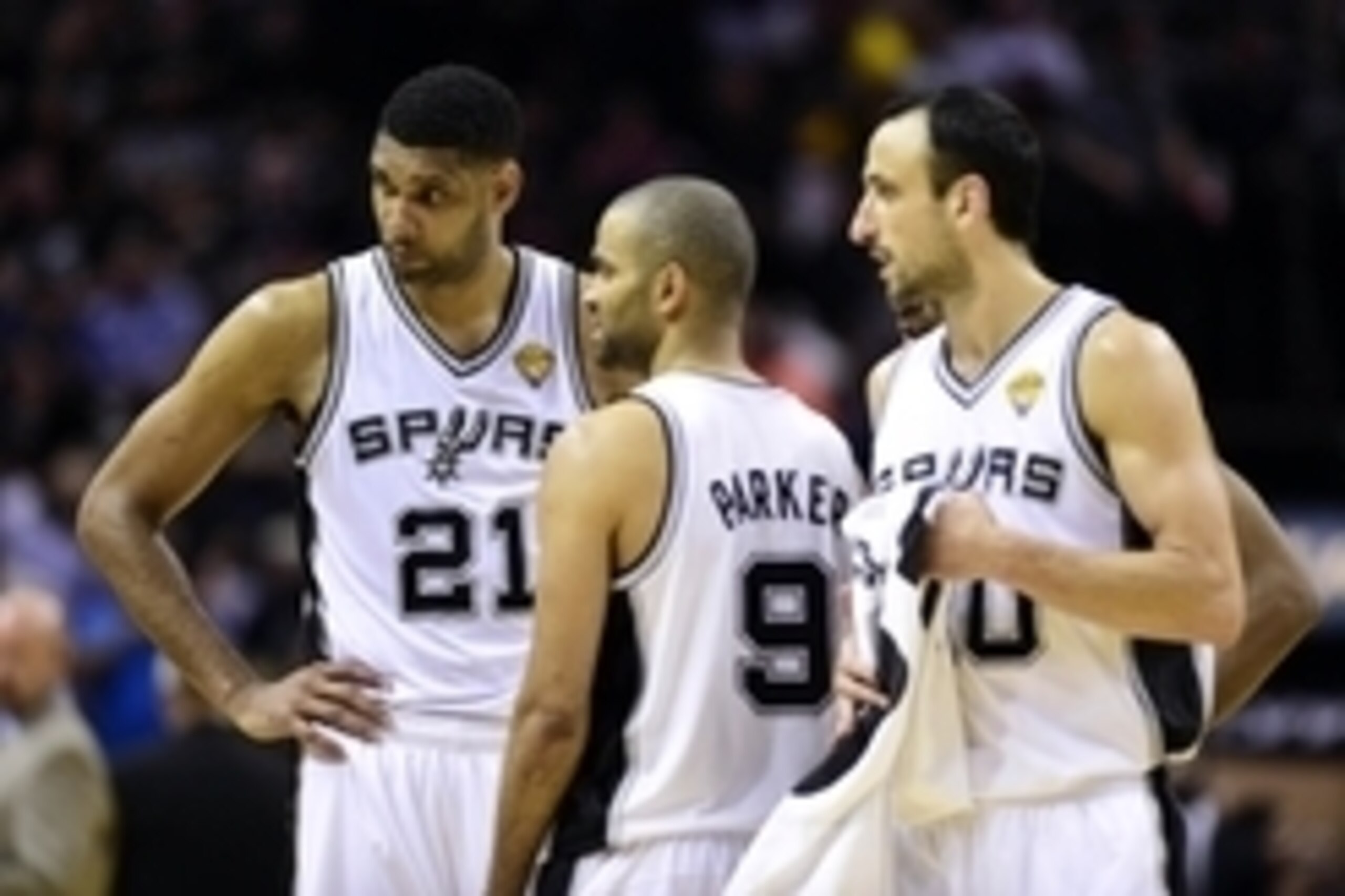Jun 8, 2014; San Antonio, TX, USA; San Antonio Spurs forward Tim Duncan (21), guard Tony Parker (9) and guard Manu Ginobili (20) talk during the fourth quarter against the Miami Heat in game two of the 2014 NBA Finals at AT&T Center. The Heat won 98-96. M