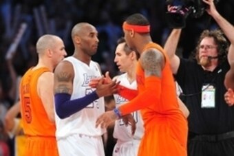 December 25, 2012; Los Angeles, CA, USA; Los Angeles Lakers shooting guard Kobe Bryant (24) greets New York Knicks small forward Carmelo Anthony (7) following the 100-94 victory at Staples Center. Mandatory Credit: Gary A. Vasquez-USA TODAY Sports