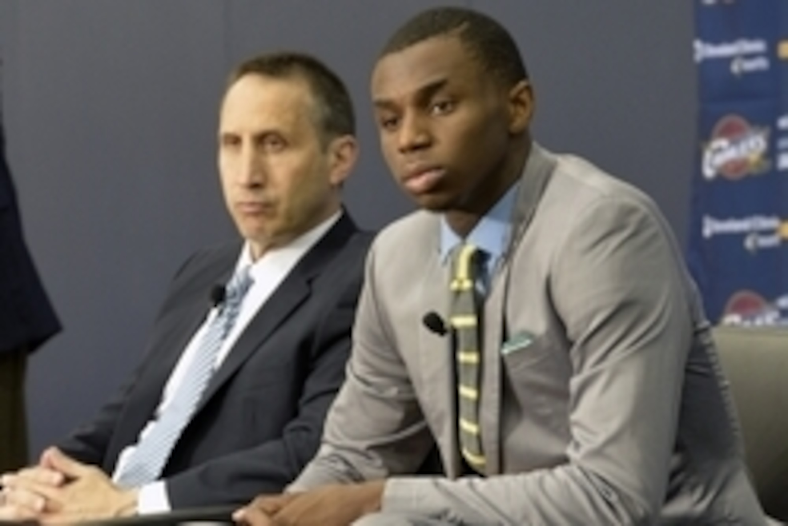 Jun 27, 2014; Independence, OH, USA; Cleveland Cavaliers head coach David Blatt (left) listens as first round pick Andrew Wiggins speaks to the media at Cleveland Clinic Courts. Mandatory Credit: David Richard-USA TODAY Sports