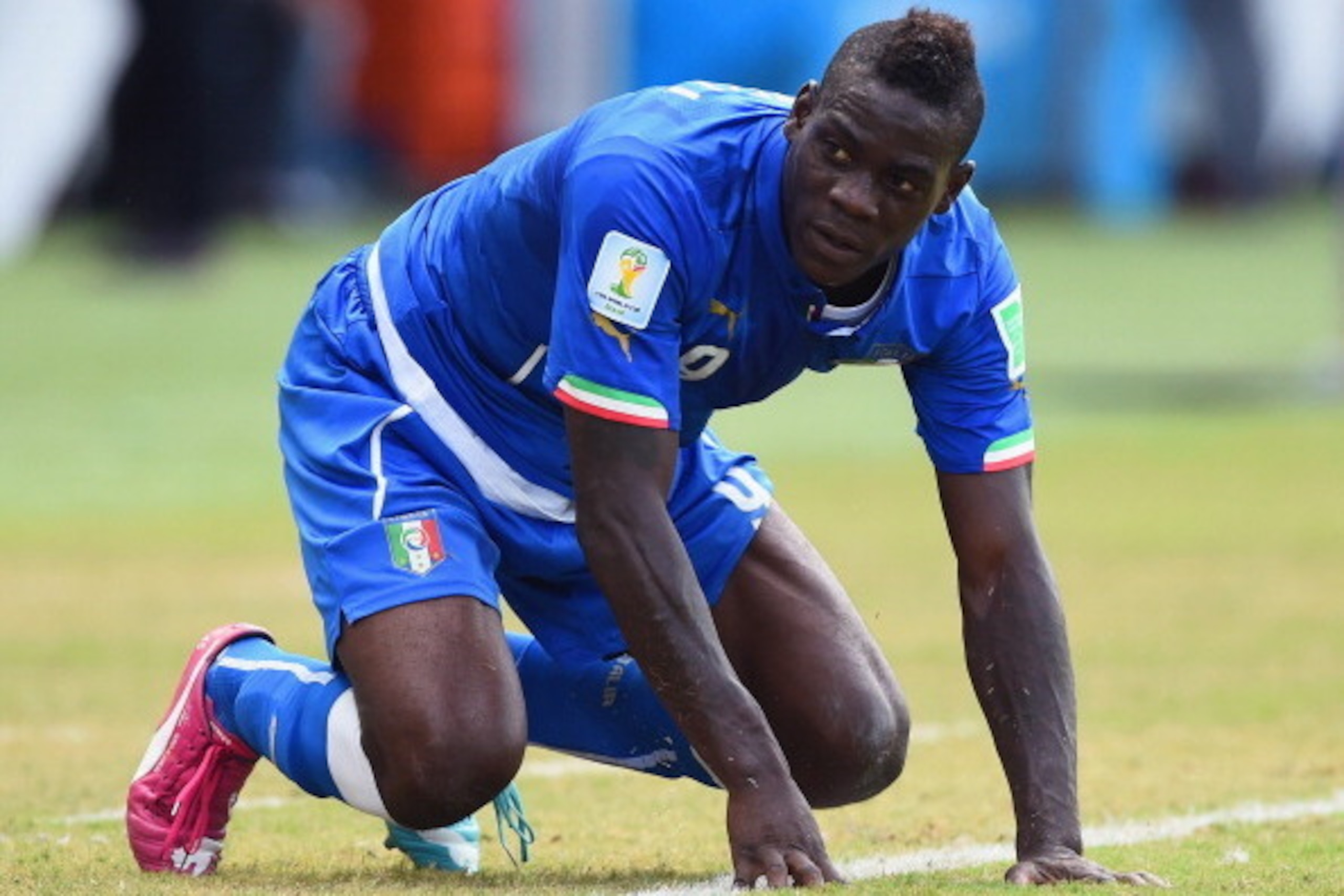 NATAL, BRAZIL - JUNE 24:  Mario Balotelli of Italy reacts during the 2014 FIFA World Cup Brazil Group D match between Italy and Uruguay at Estadio das Dunas on June 24, 2014 in Natal, Brazil.  (Photo by Matthias Hangst/Getty Images)