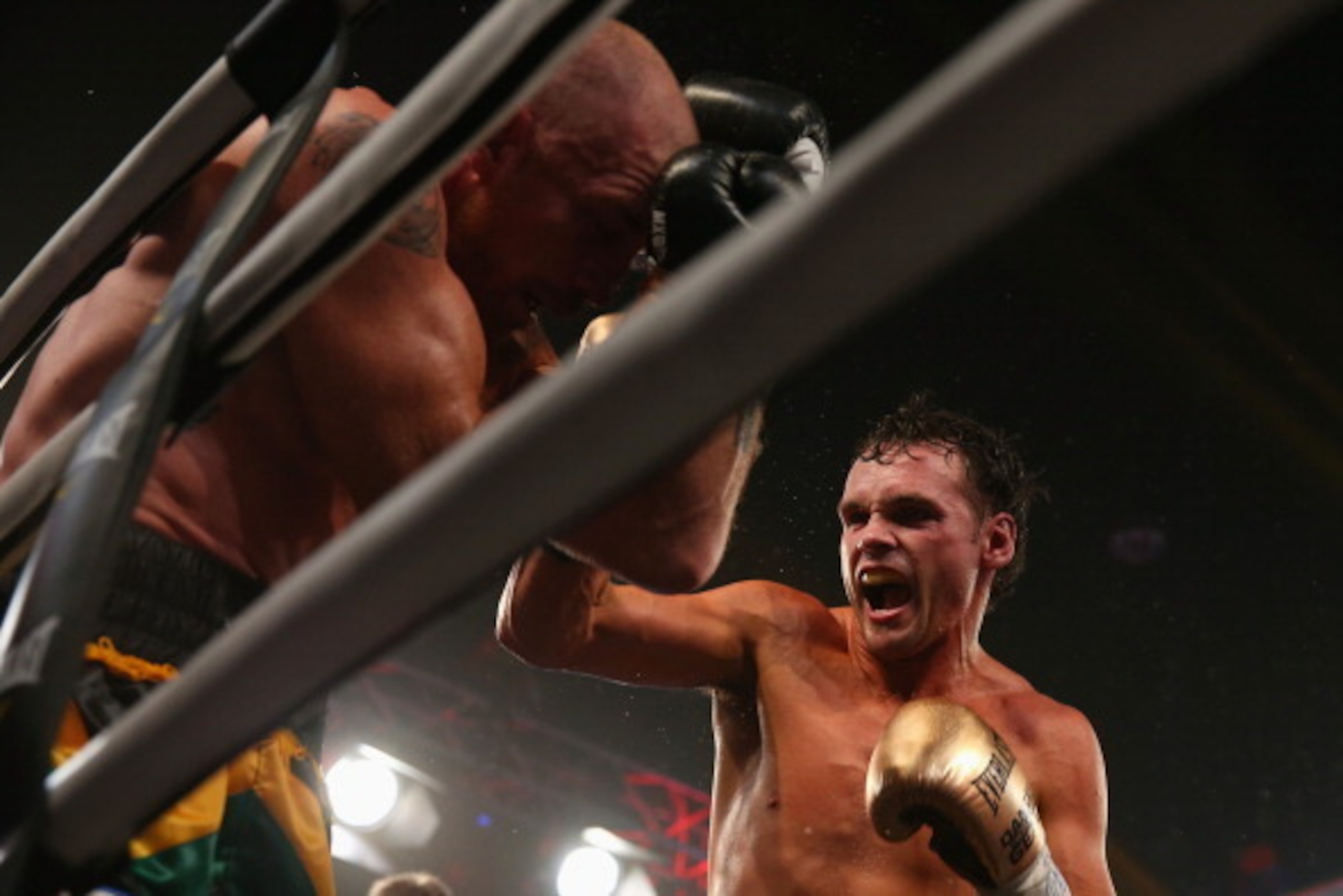 SYDNEY, AUSTRALIA - FEBRUARY 19:  Garth Wood is punched in his fight against Daniel Geale during the I.B.F. Middleweight Pan Pacific title bout between Garth Wood of Australia and Daniel Geale of Australia at the Hordern Pavilion on February 19, 2014 in S