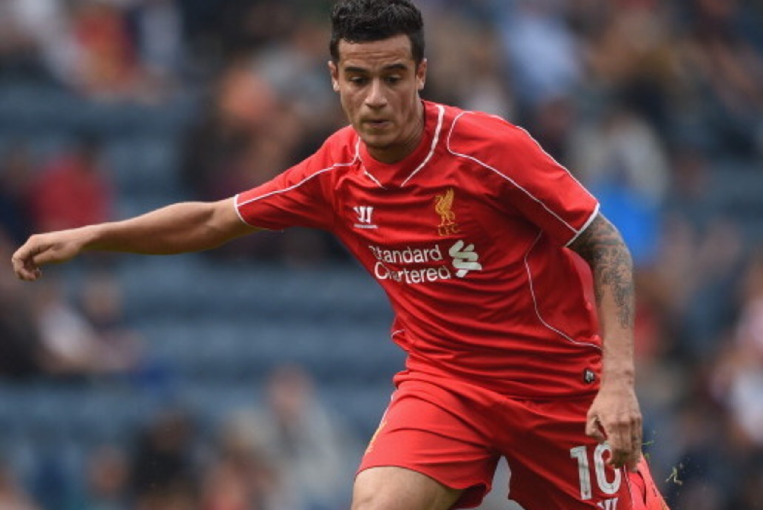 PRESTON, LANCASHIRE - JULY 19:  Philippe Coutinho of Liverpool in action during the pre season friendly match between Preston North End and Liverpool at Deepdale on July 19, 2014 in Preston, Lancashire.  (Photo by Michael Regan/Getty Images)