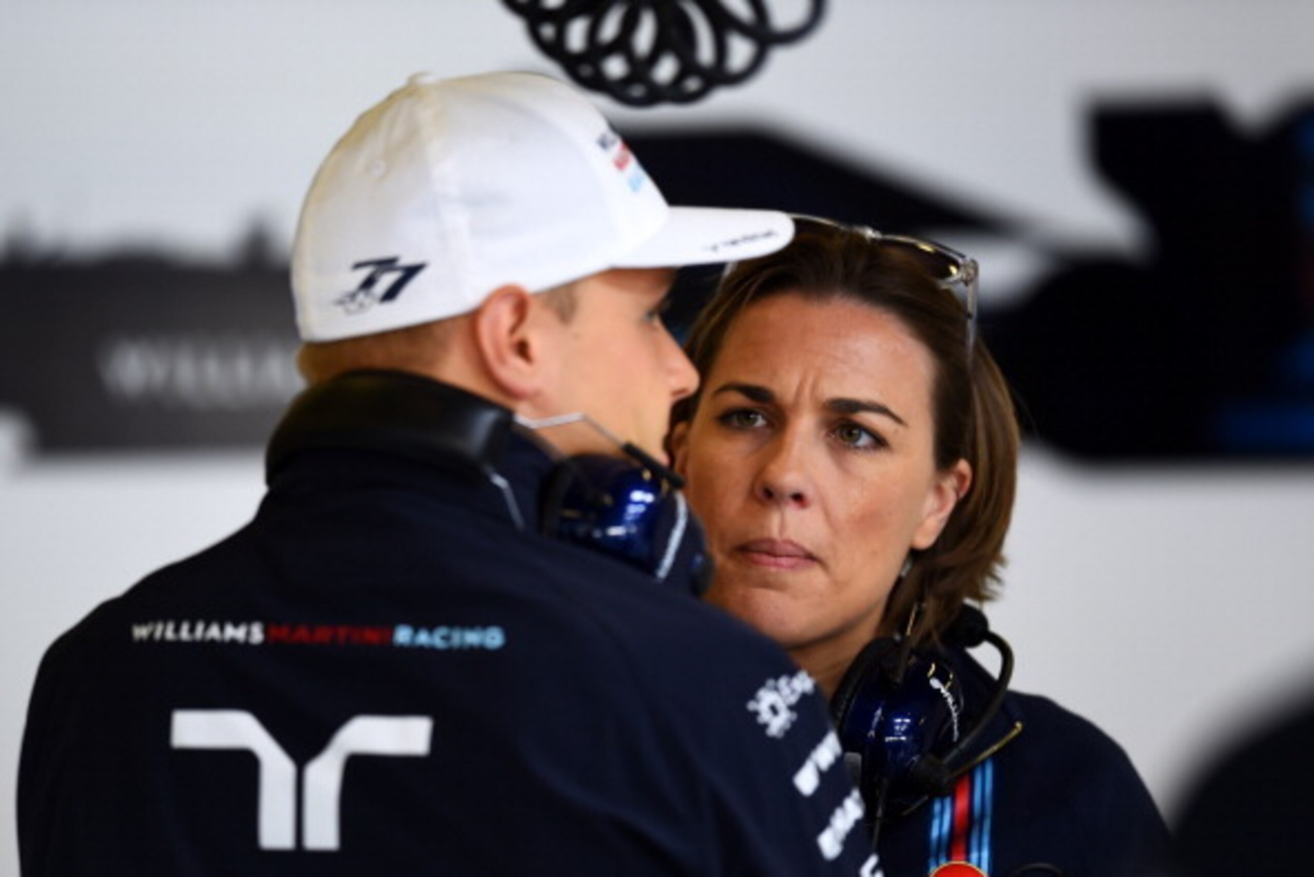 NORTHAMPTON, ENGLAND - JULY 04:  Deputy team principal Claire Williams speaks with Valtteri Bottas of Finland and Williams in the garage during practice ahead of the British Formula One Grand Prix at Silverstone Circuit on July 4, 2014 in Northampton, Uni