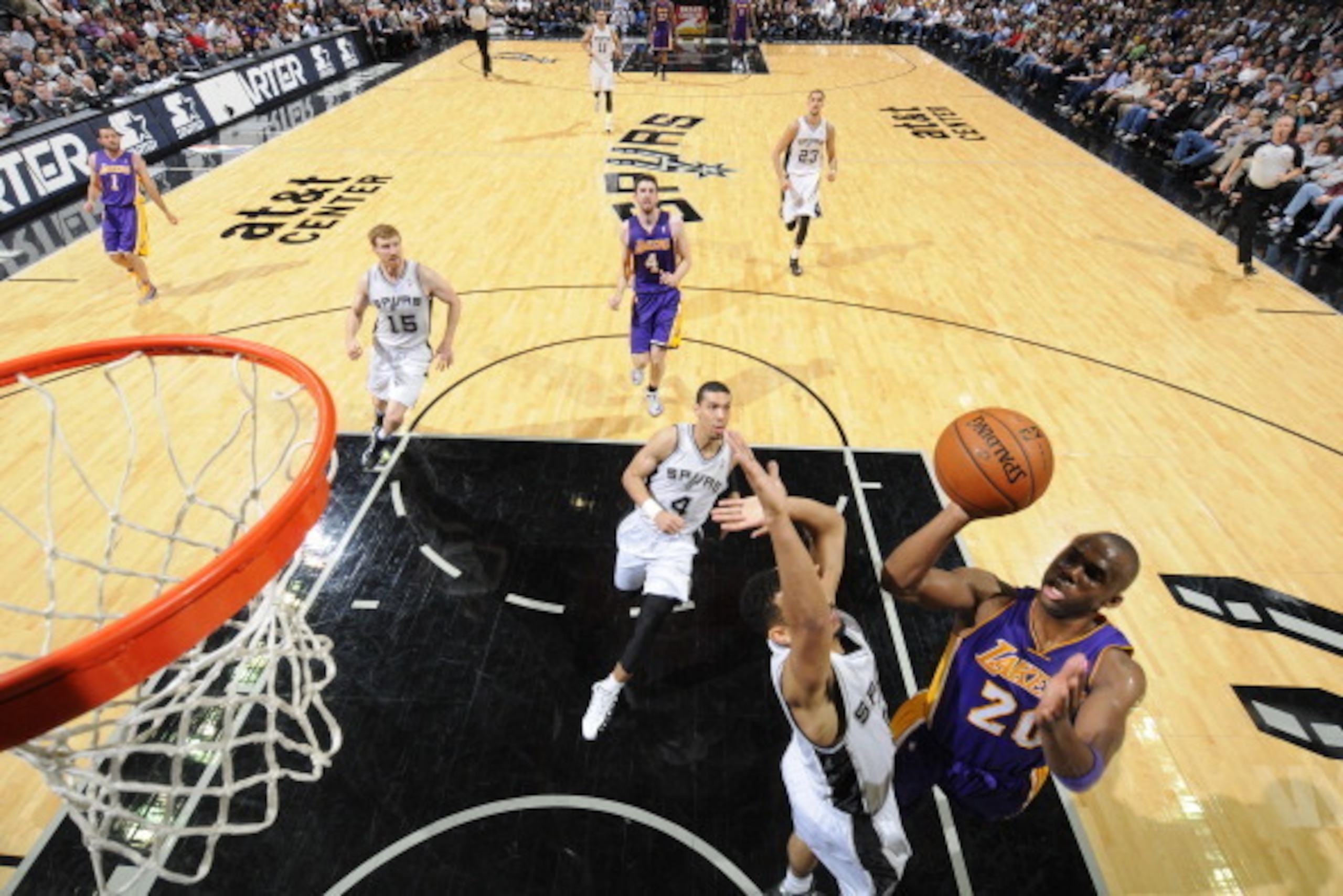 SAN ANTONIO, TX - April 16: Jodie Meeks #20 of the Los Angeles Lakers goes up for a shot against the San Antonio Spurs during the game at the AT&T Center on April 16, 2014 in San Antonio, Texas. NOTE TO USER: User expressly acknowledges and agrees that, b