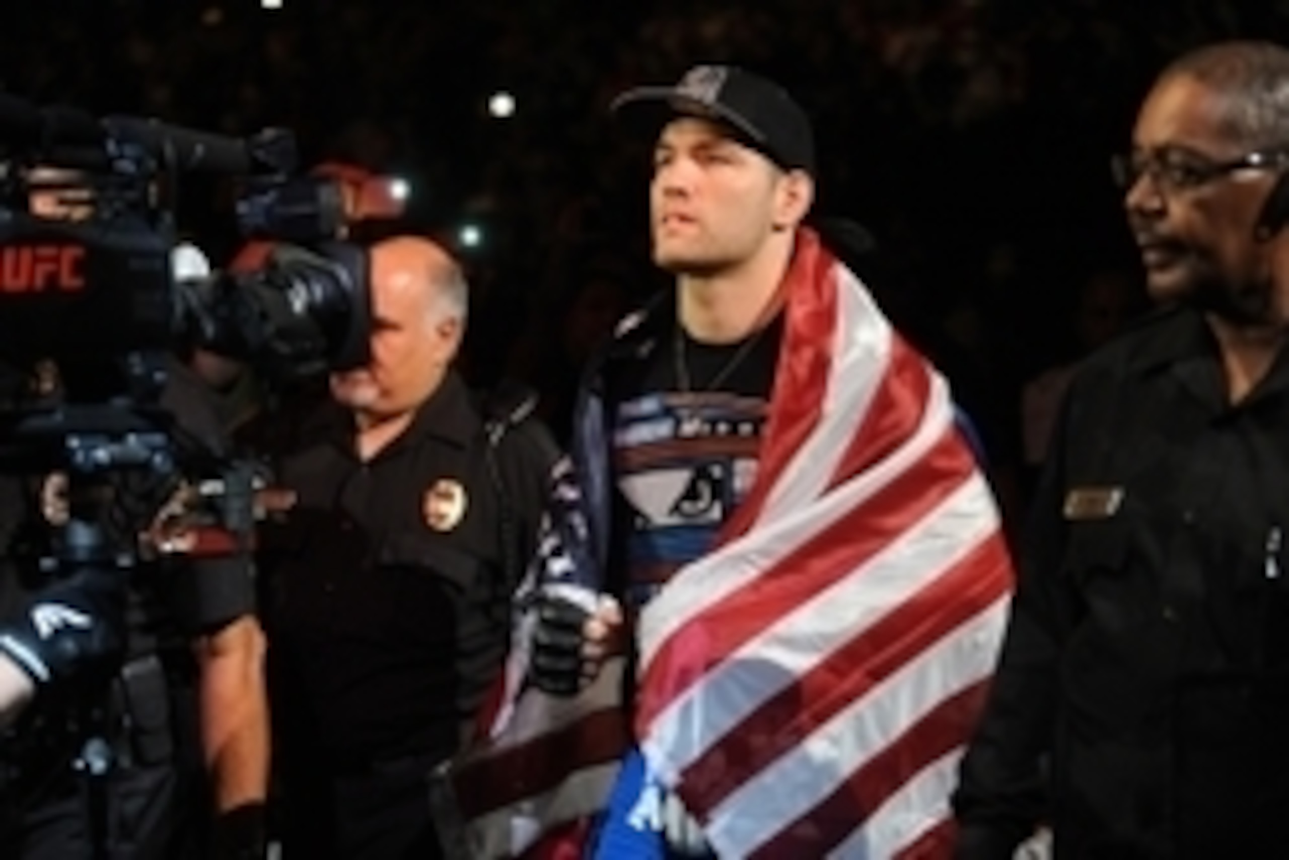 Jul 5, 2014; Las Vegas, NV, USA; Chris Weidman gets ready to enter the octagon for a middleweight title fight against Lyoto Machida at Mandalay Bay Events Center. Mandatory Credit: Stephen R. Sylvanie-USA TODAY Sports