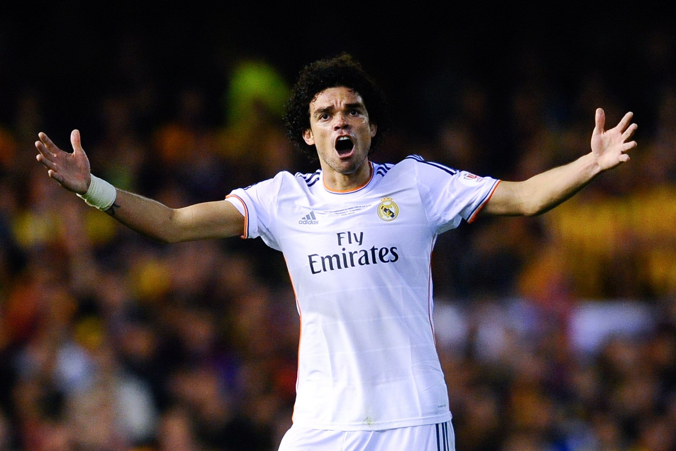 VALENCIA, SPAIN - APRIL 16:  Pepe of Real Madrid CF celebrates after winning the Copa del Rey Final between Real Madrid and FC Barcelona at Estadio Mestalla on April 16, 2014 in Valencia, Spain.  (Photo by David Ramos/Getty Images)