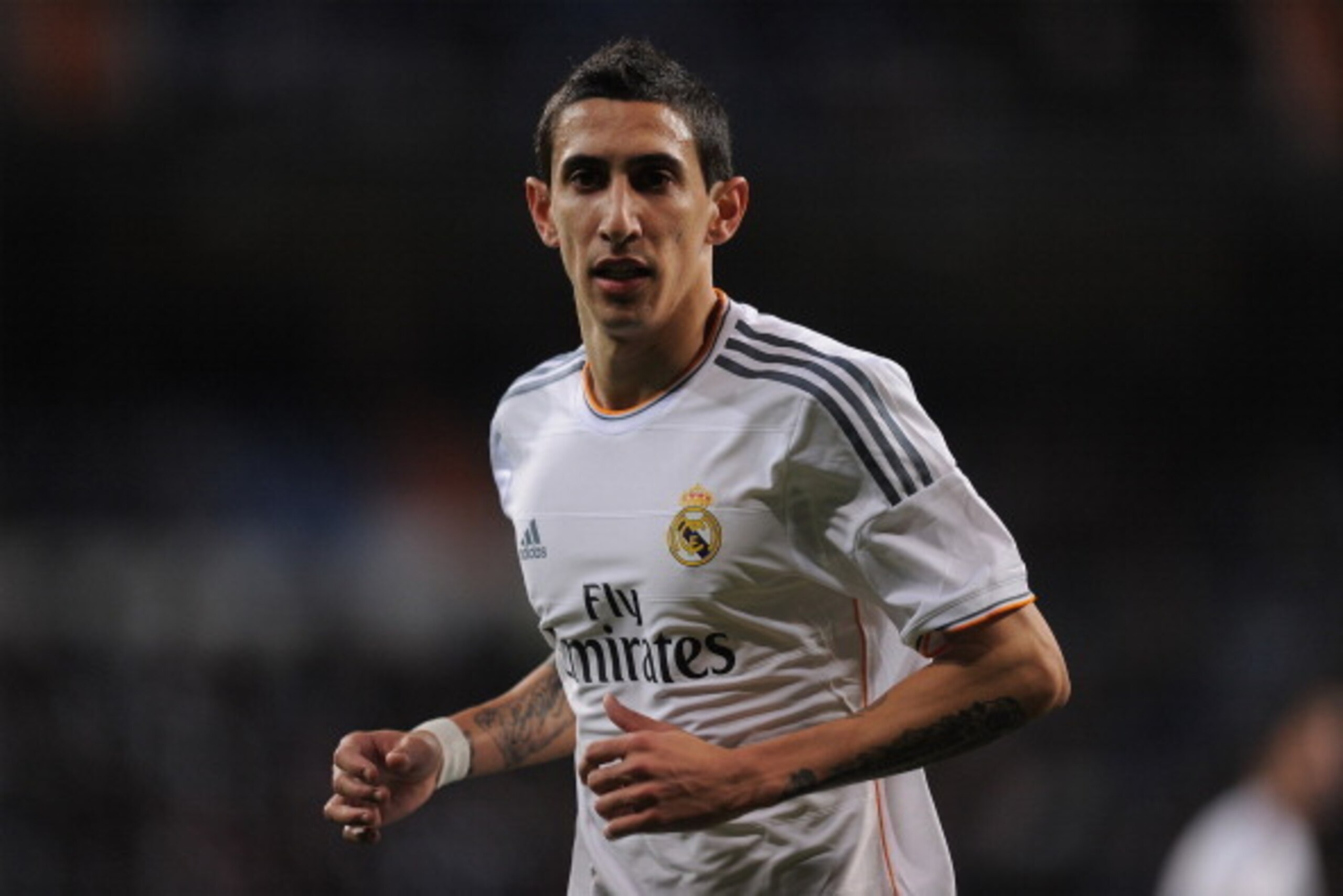 MADRID, SPAIN - JANUARY 28:  Angel Di Maria of Real Madrid CF looks on during during the Copa Del Rey Quarter Final, 2nd leg match between Real Madrid CF and RCD Espanyol at Estadio Santiago Bernabeu on January 28, 2014 in Madrid, Spain.  (Photo by Denis 