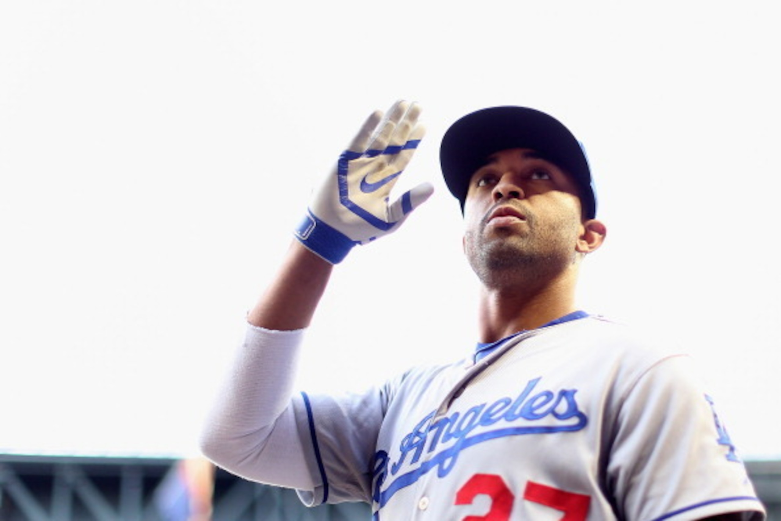 PHOENIX, AZ - MAY 16:  Matt Kemp #27 of the Los Angeles Dodgers in the dugout before the MLB game against the Arizona Diamondbacks at Chase Field on May 16, 2014 in Phoenix, Arizona.  The Dodgers defeated the Diamondbacks 7-0.  (Photo by Christian Peterse