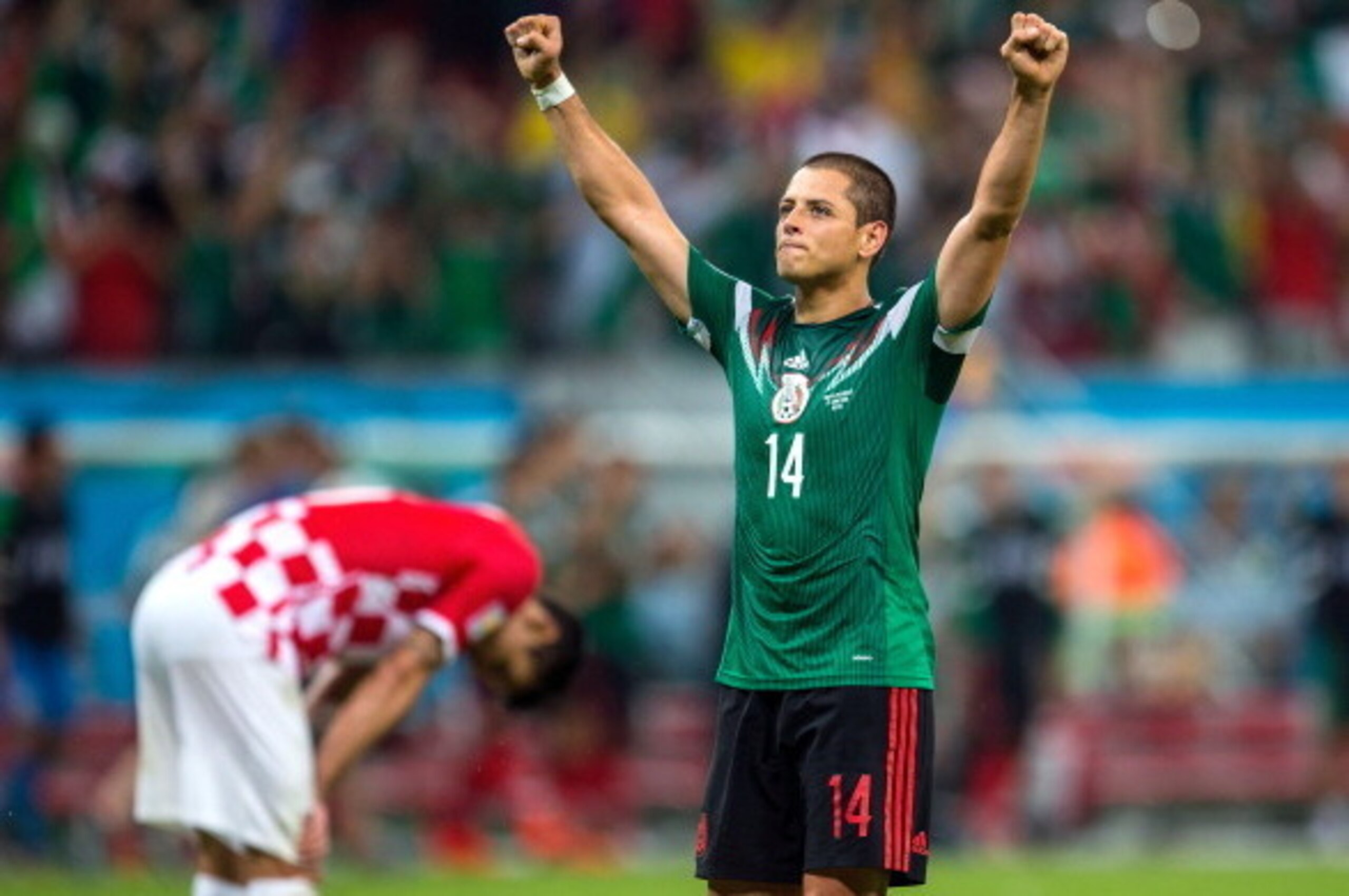 RECIFE, BRAZIL - JUNE 23:  Javier Hernandez of Mexico celebrates scoring his team's third goal during the 2014 FIFA World Cup Brazil Group A match between Croatia and Mexico at Arena Pernambuco on June 23, 2014 in Recife, Brazil.  (Photo by Miguel Tovar/G