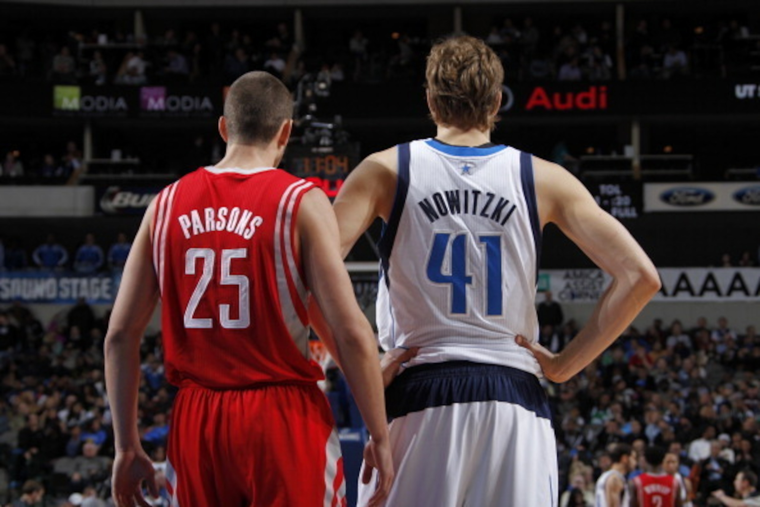 DALLAS, TX - JANUARY 29: Dirk Nowitzki #41 of the Dallas Mavericks and Chandler Parsons #25 of the Houston Rockets on January 29, 2014 at the American Airlines Center in Dallas, Texas. NOTE TO USER: User expressly acknowledges and agrees that, by download