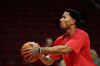 CHICAGO, IL - FEBRUARY 11:  Derrick Rose #1 of the Chicago Bulls, who suffered a season-ending knee injury in November, practices his shooting before the Bulls take on the Atlanta Hawks at the United Center on February 11, 2014 in Chicago, Illinois. NOTE 