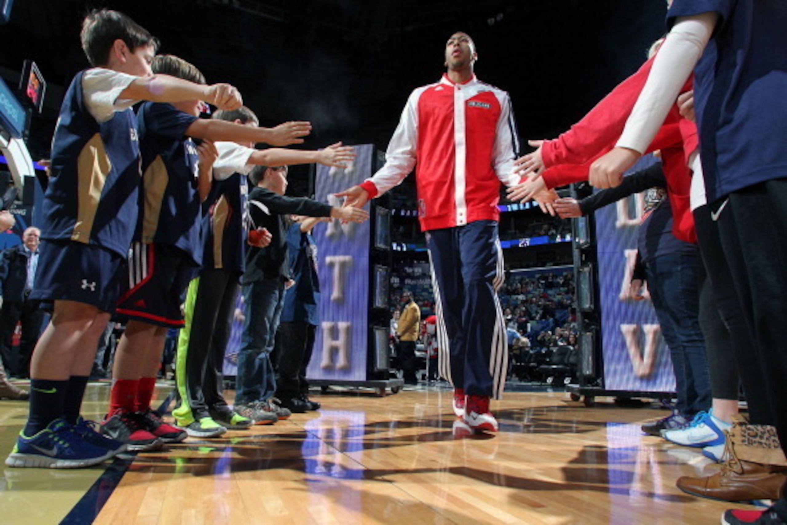 NEW ORLEANS, LA - JANUARY 21:  Anthony Davis #23 of the New Orleans Pelicans gets introduced before the game against the Sacramento Kings on January 21, 2014 at the New Orleans Arena in New Orleans, Louisiana. NOTE TO USER: User expressly acknowledges and