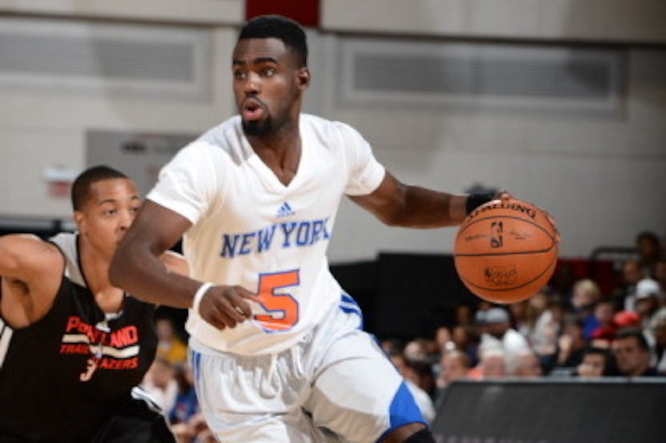 LAS VEGAS, NV - JULY 12: Tim Hardaway Jr. #5 of the New York Knicks dribbles up the court against the Portland Trailblazers on July 12, 2014 at Cox Pavilion in Las Vegas, Nevada. NOTE TO USER: User expressly acknowledges and agrees that, by downloading an