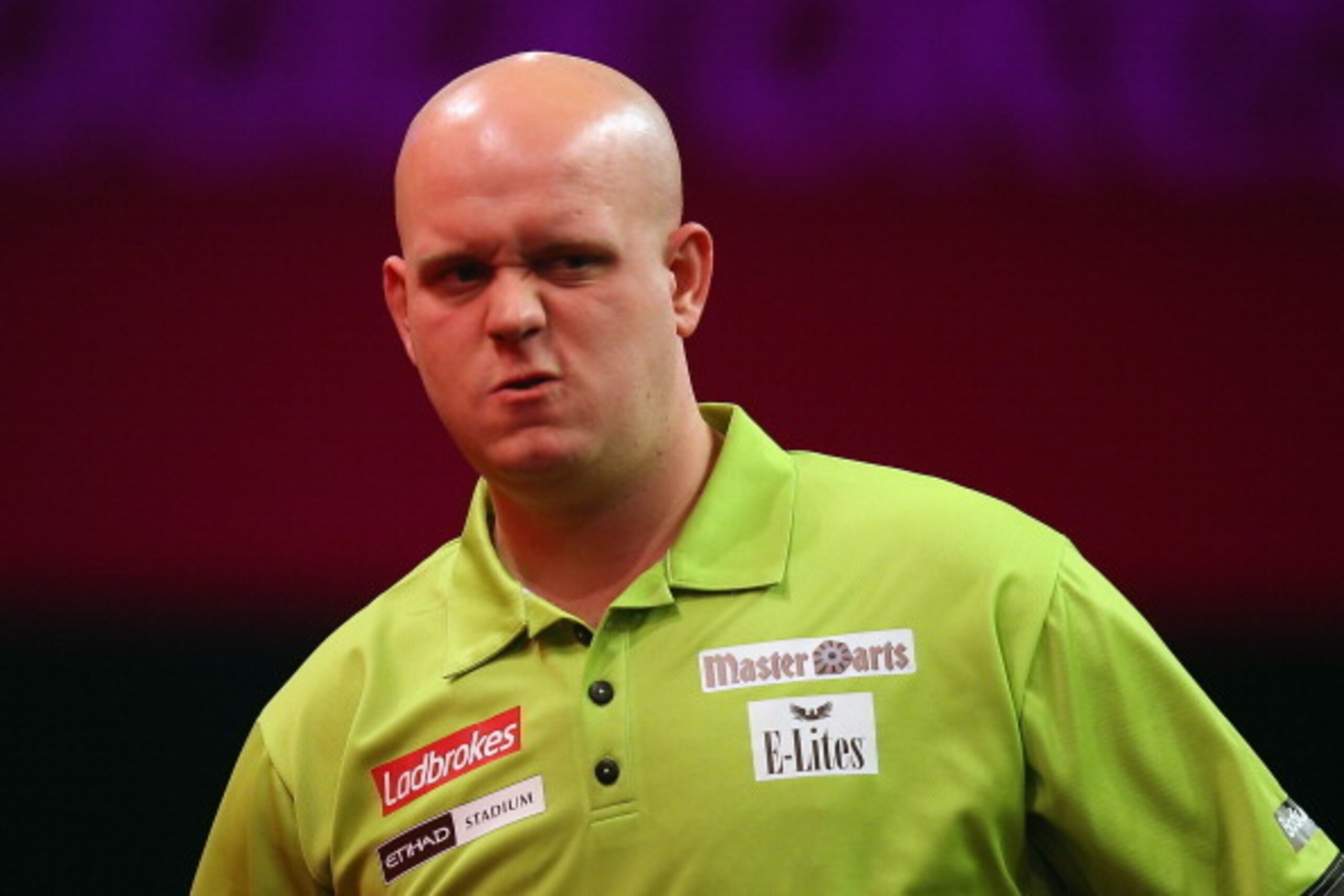 LONDON, ENGLAND - DECEMBER 17:  Michael van Gerwen of The Netherlands reacts during his first round match against Zoran Lerchbacher of Austria during day five of the 2014 Ladbrokes.com World Darts Championship at Alexandra Palace on December 17, 2013 in L