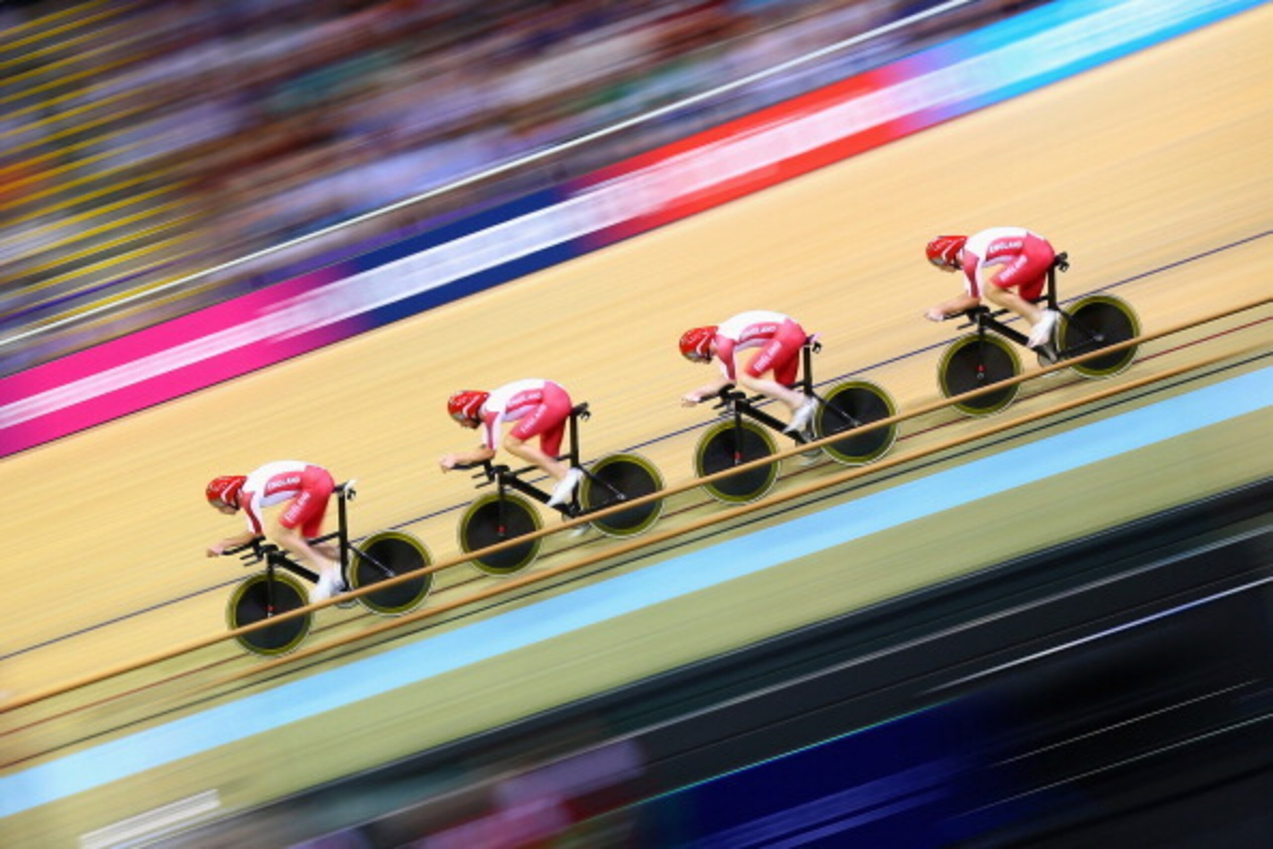 GLASGOW, SCOTLAND - JULY 24:  Steven Burke, Ed Clancy, Andy Tennant and Bradley Wiggins of England compete in MenÂs 4000 metres Team Pursuit qualification at Sir Chris Hoy Velodrome during day one of the Glasgow 2014 Commonwealth Games on July 24, 2014 in