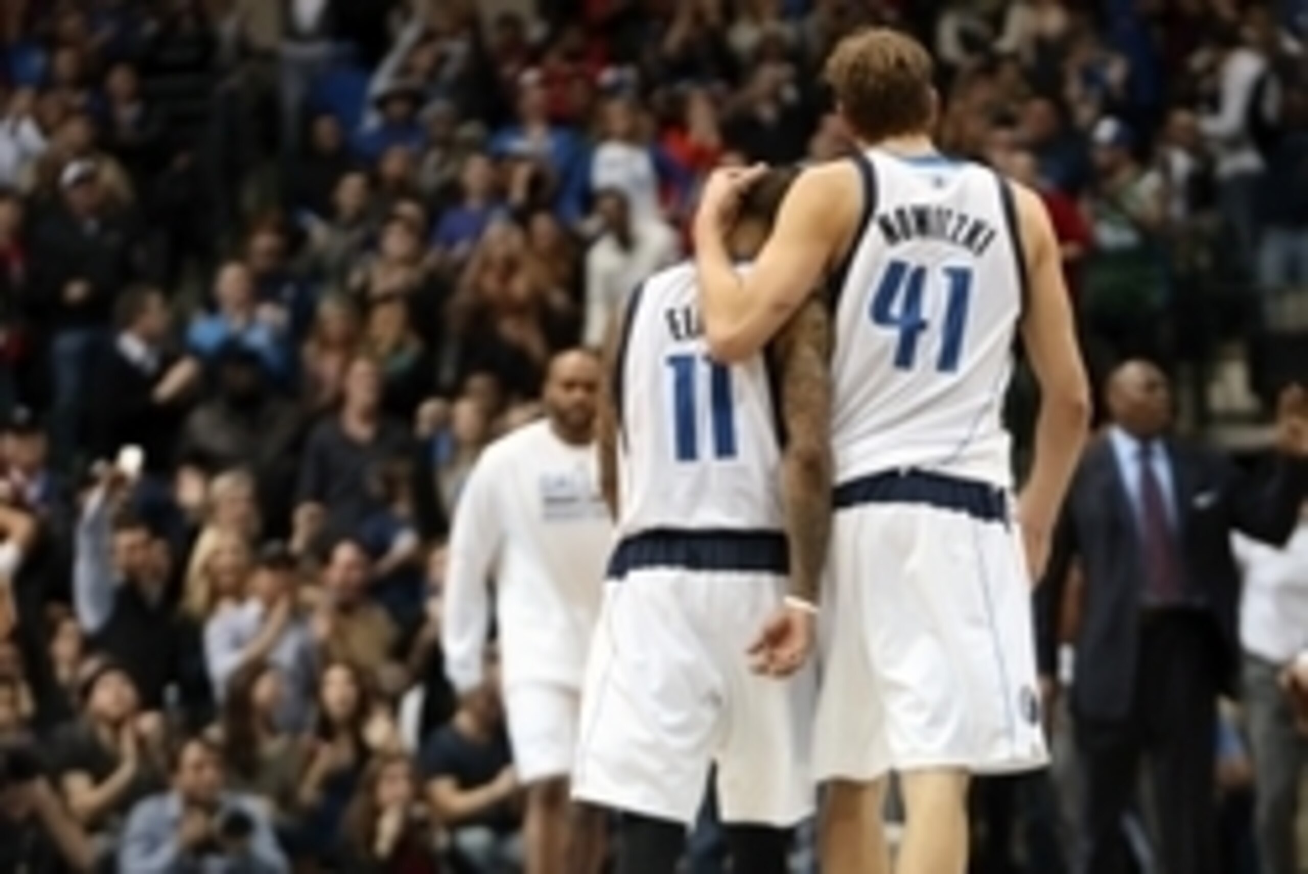Dec 20, 2013; Dallas, TX, USA; Dallas Mavericks shooting guard Monta Ellis (11) and power forward Dirk Nowitzki (41) react during the game against the Toronto Raptors at American Airlines Center. Toronto won 109-108. Mandatory Credit: Kevin Jairaj-USA TOD